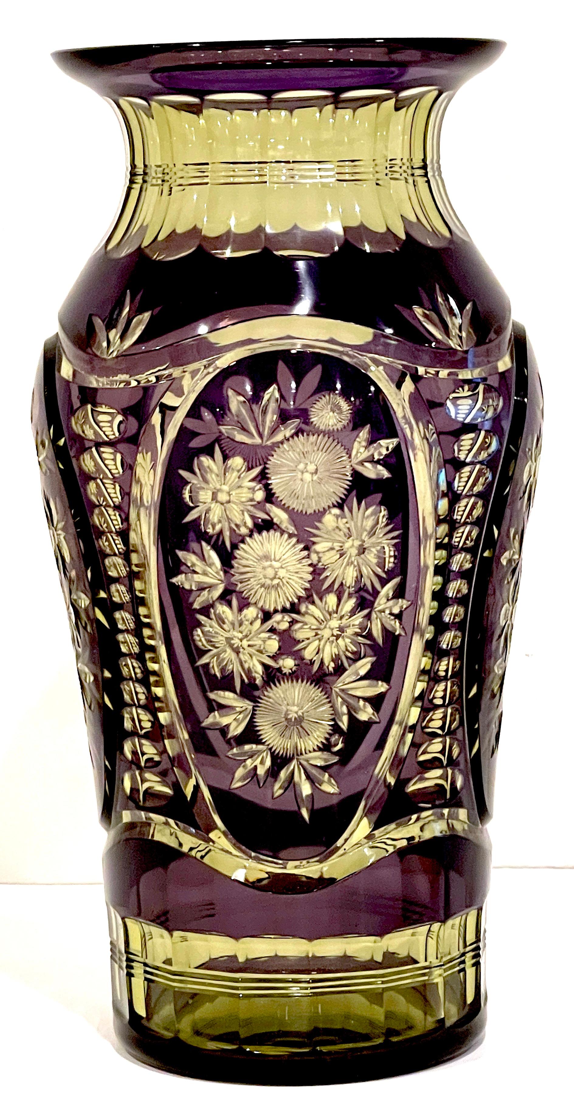 Art Deco Floral Engraved Amethyst & Uranium Crystal vase by Val St. Lambet
Belgium, Circa 1920s
Attributed: Val Saint Lambert is a Belgian crystal glassware manufacturer, founded in 1826, It has the royal warrant of King Albert II.

An