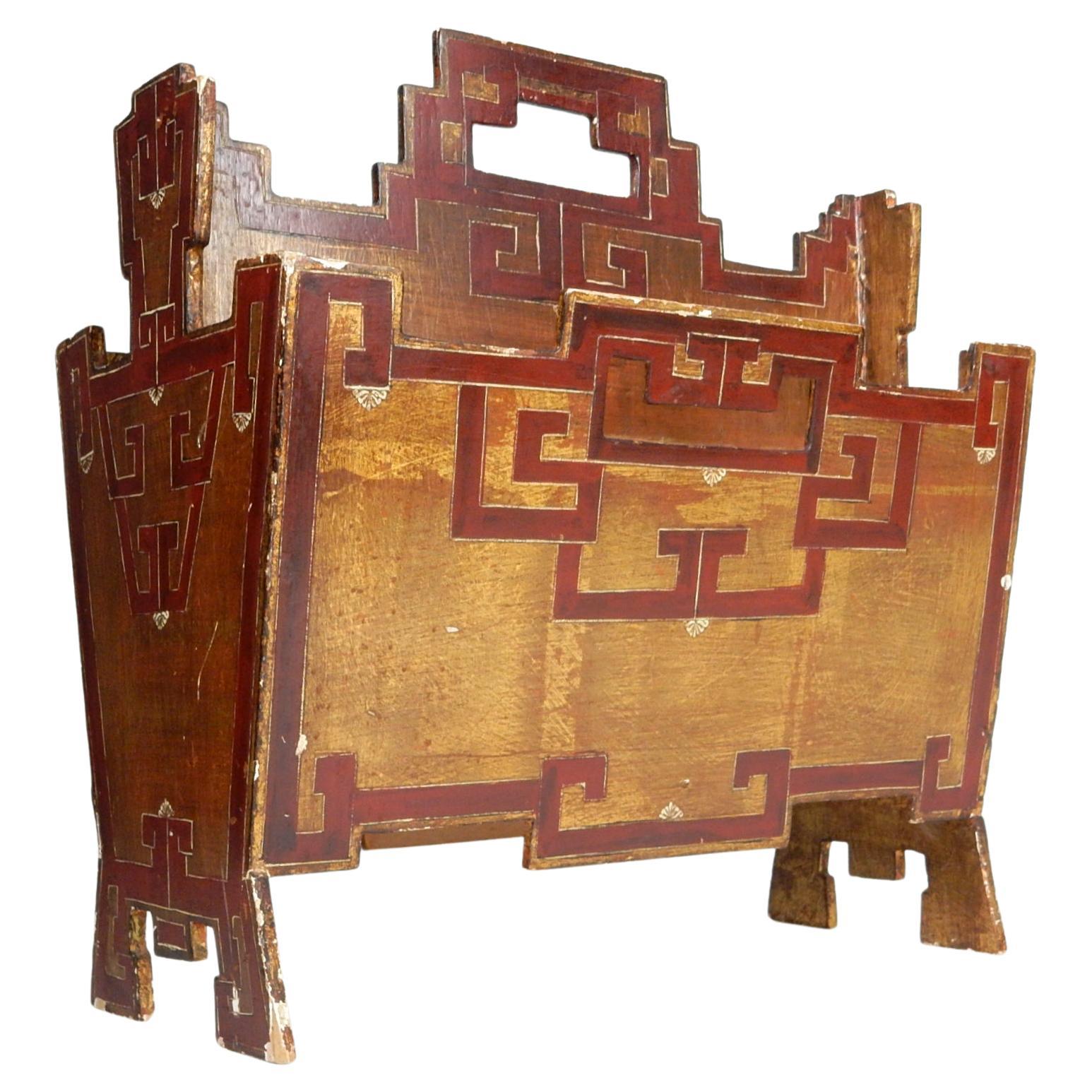 Unique Greek key design on this gilt wood magazine stand from Florentine Italy.
Decorated on all 4 sides. Warm aged patina on gilt enamel.
Signed with paper label on bottom. circa 1950s.
