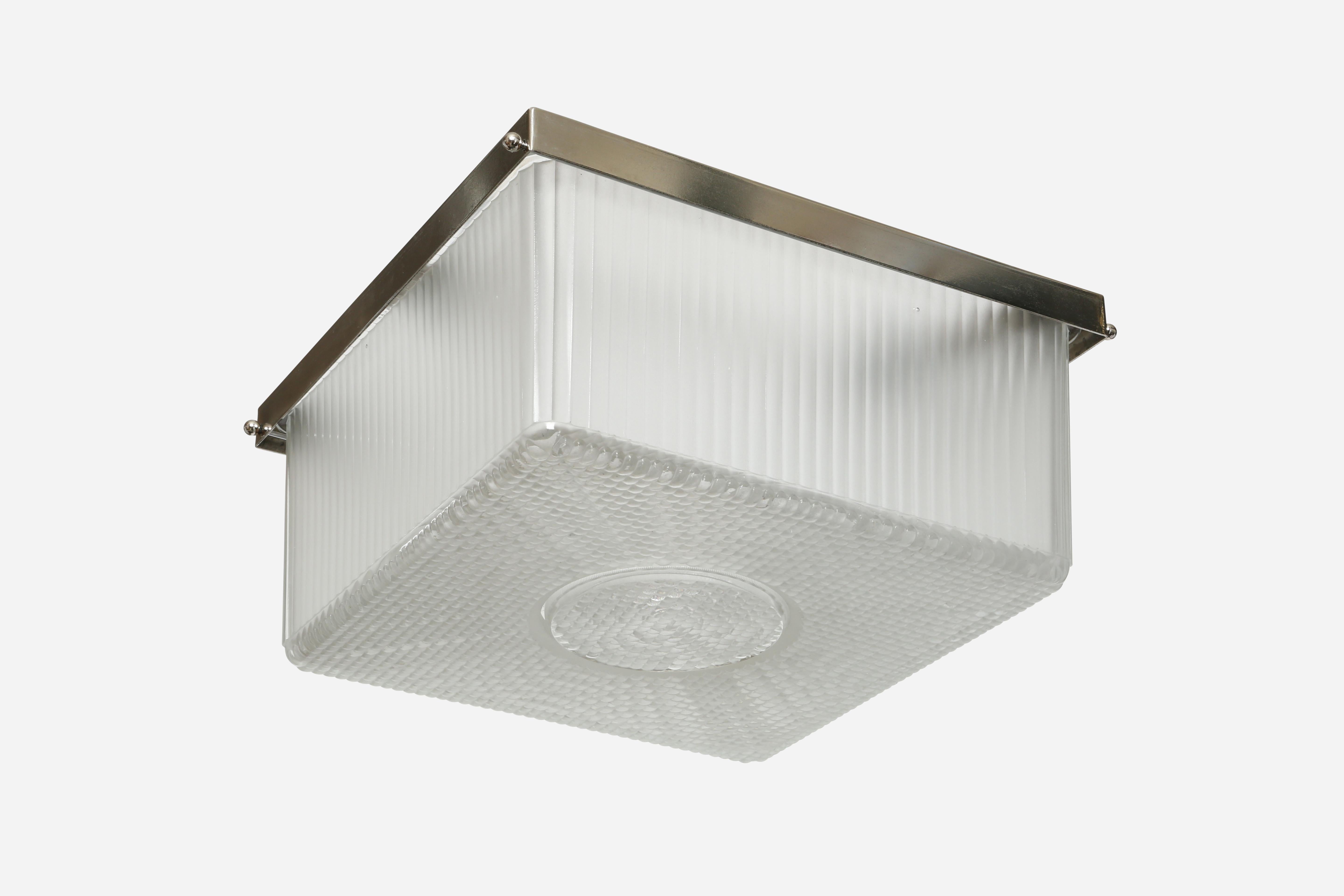 Art Deco flush mount ceiling light.
Made in France in 1940s
Textured glass, nickel plated frame.
One medium base bulb each.
Rewired for US.
Intricate glass pattern, excellent example of Art Deco craftsmanship.
Small removable circle in the glass for