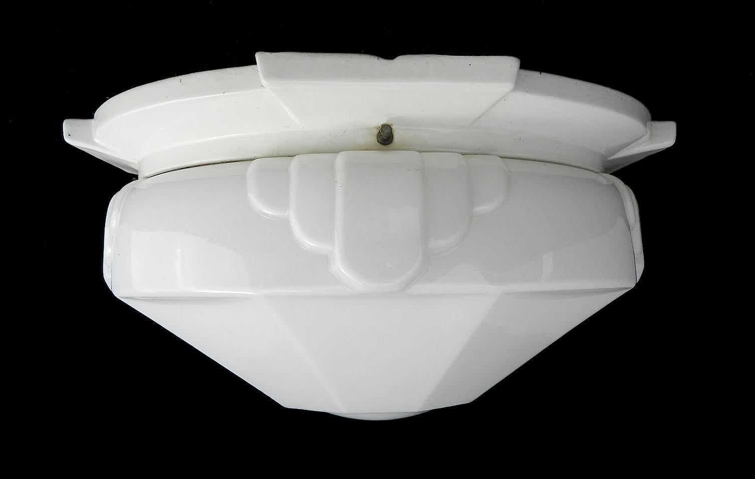 Art Deco flush mount large ceiling light or wall light sconce with Odeon glass shade circa 1930
All original white opaque glass shade on its white porcelain mount
Makers numbers impressed on the mount
This takes two bulbs at present
Opaque white