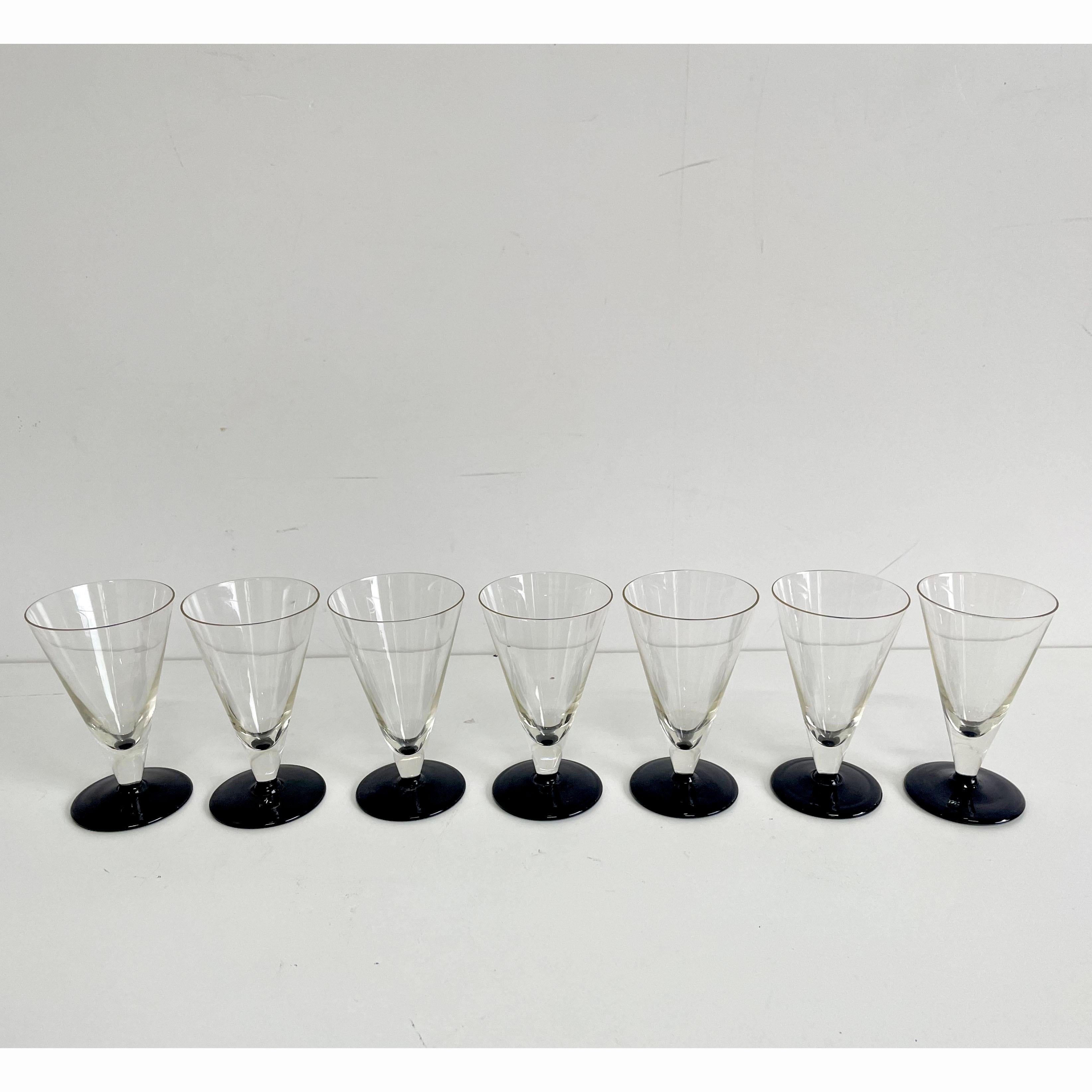 Very beautiful, simple and elegant 1930s Art Deco aperitif drinking glasses

Made of delicate hand blown glass

Set of 7 (7th glass is a spare glass)

The glasses are in great condition, with minimal traces of age and use
There are no chips, cracks