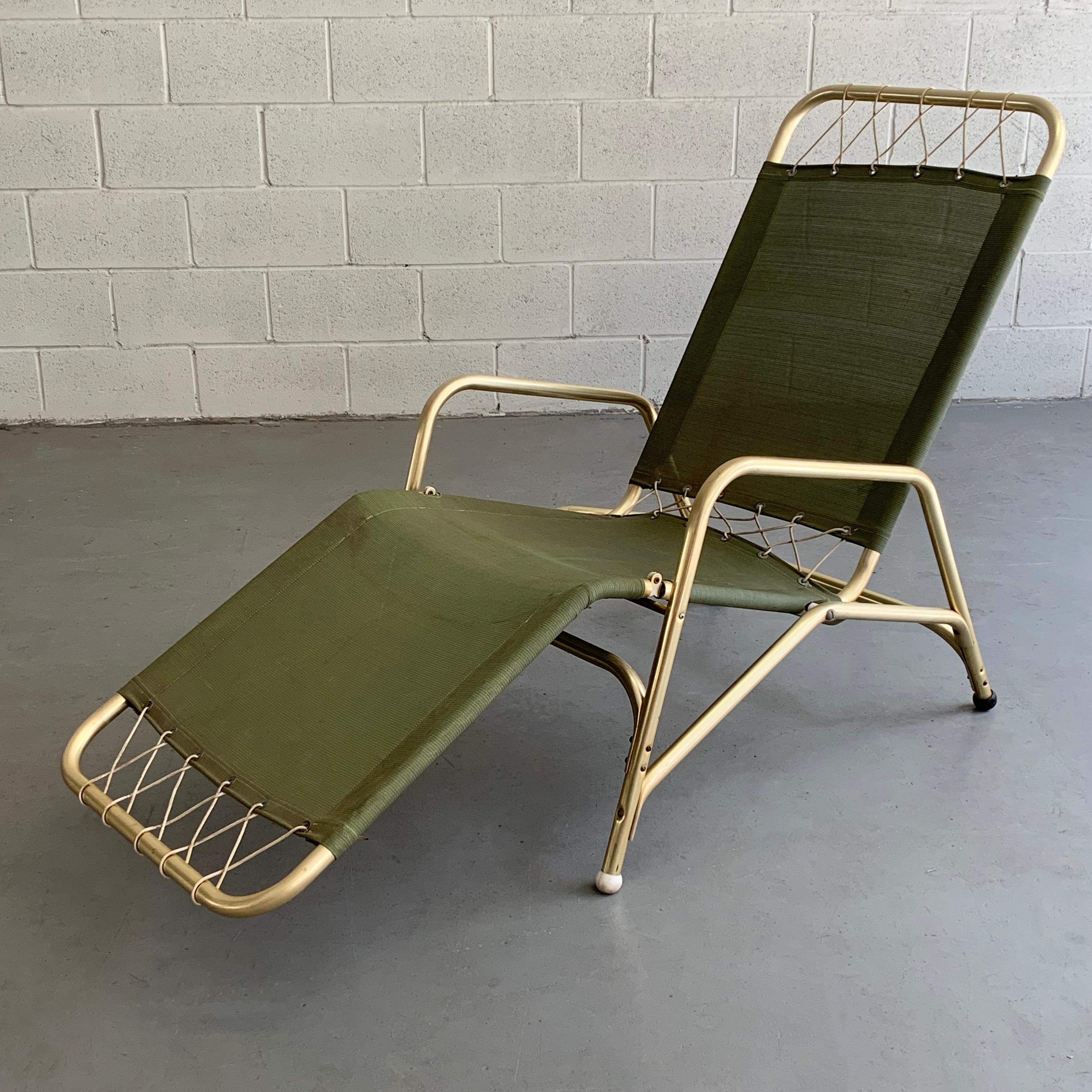 Art Deco, folding, aluminum frame, lounge chair by The Troy Sunshade Company features a green, woven nylon seat that elevates from 11 - 16 inches height when extended flat.