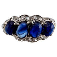 Art Deco Four Stone Cabochon Cut Sapphire and Diamond Platinum Ring