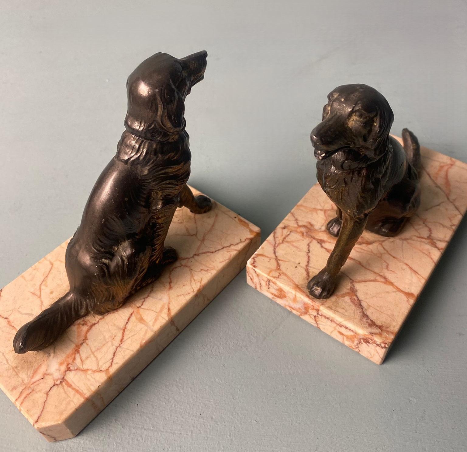 20th Century Art Deco France Pair Of Metal Bookends Featuring Dogs With A Fine Marble Base For Sale