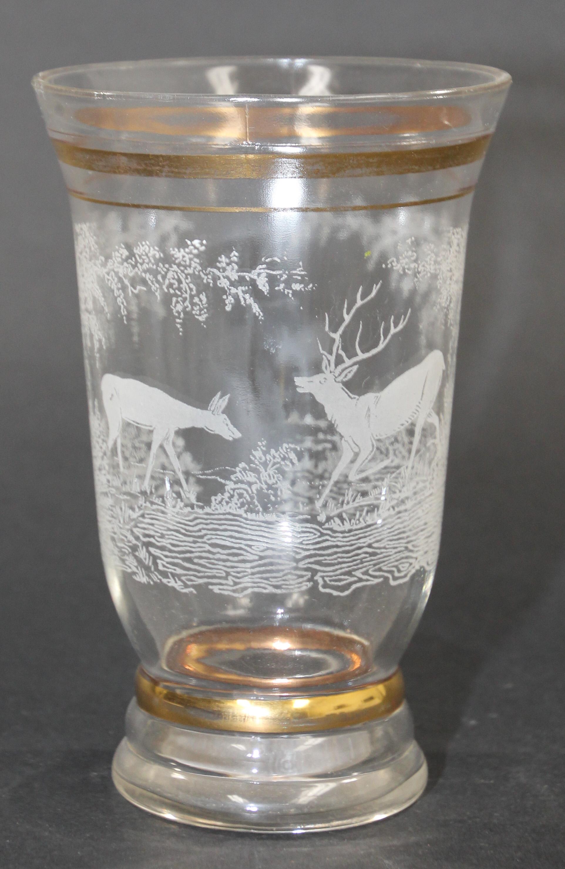 French antique vase art deco glass vase with frosted white design deer and antelope scenery in the woods.
Elegant vase with acid etched and gilded design of deer and stag in the wilderness  with ornamental gilded lines.
Circa 1930s Art Deco in the