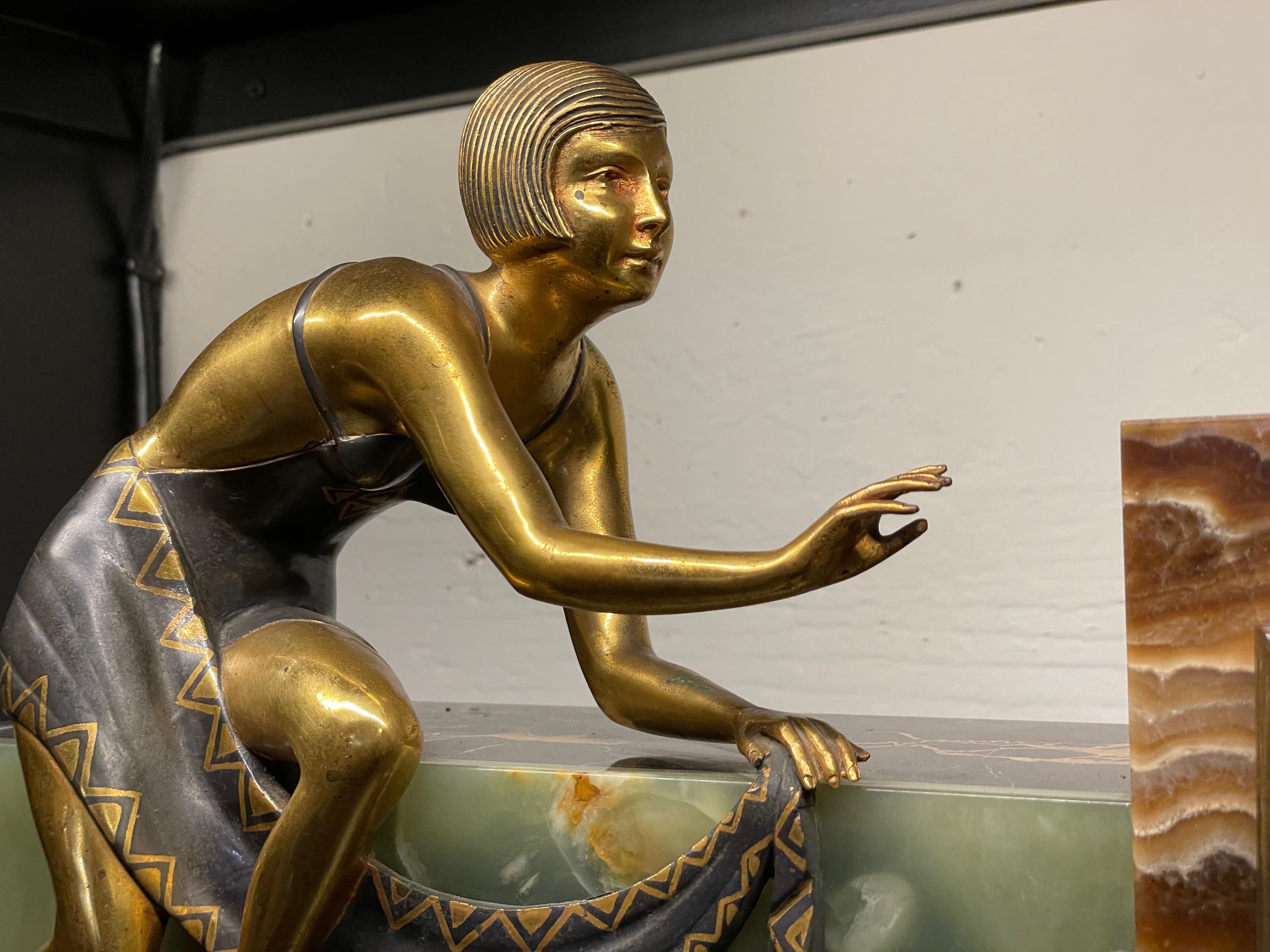 Art Deco French Asymmetrical Marble Clock and Sitting Female Statue In Good Condition In Oakland, CA