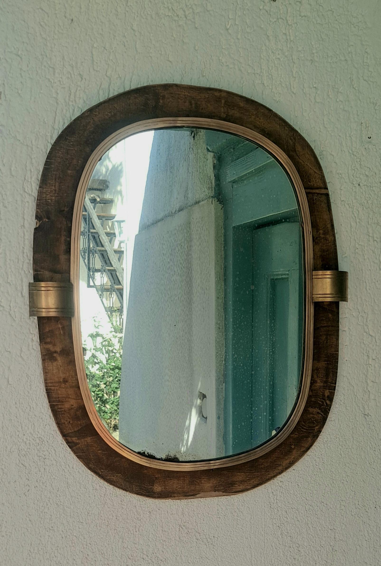Art Deco French wood and brass mirror.