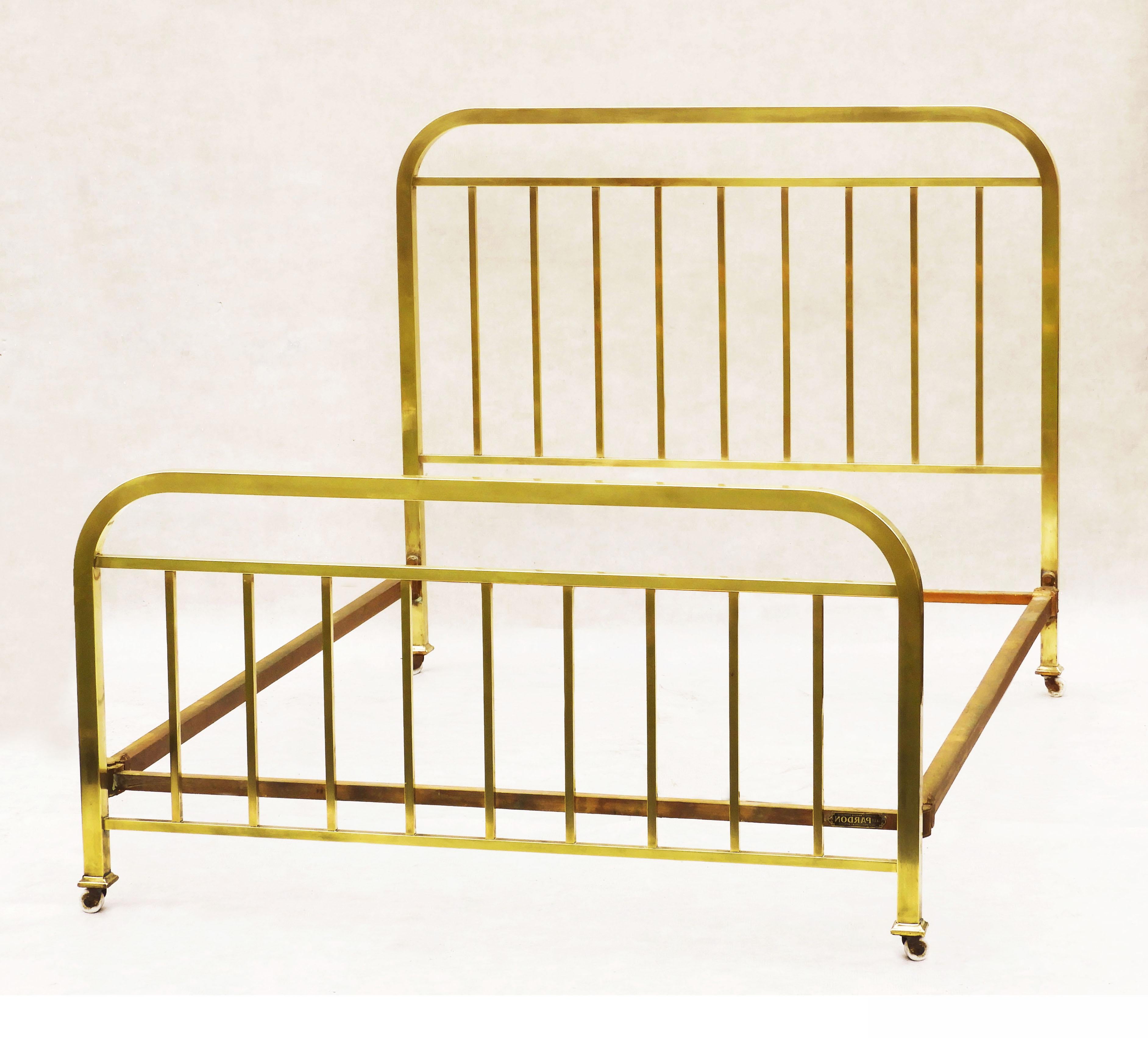 Stylish French Art Deco brass bed from Pardon c1930.  A quintessential French brass bed with an Art Deco twist. Good quality, well-made bed In good condition, sturdy and strong with good colour and nice patina.  This bed will accommodate a