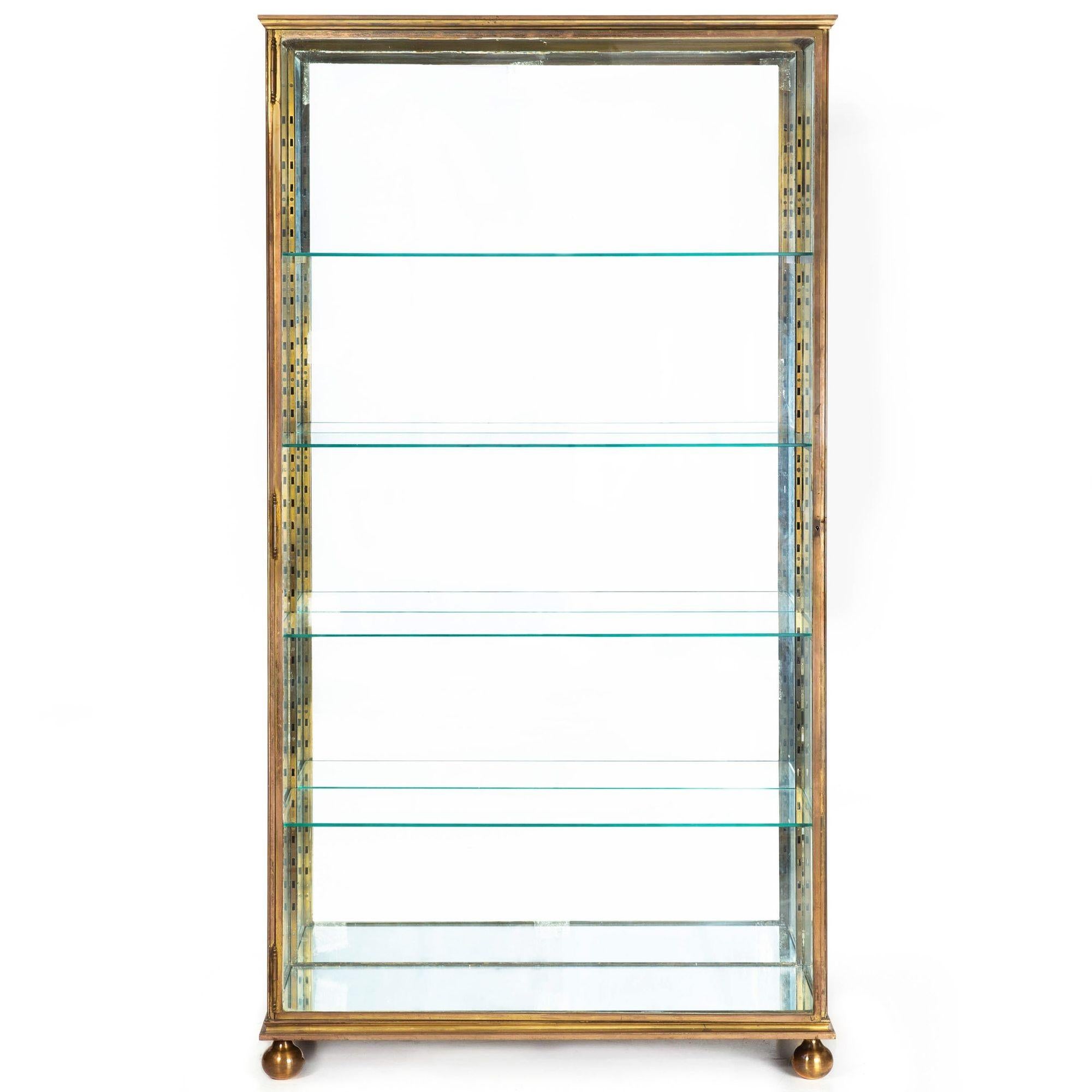 FRENCH BRONZE, BRASS AND GLASS DISPLAY CABINET
Circa early 20th century  unmarked
Item # 405KPI03A

A very sleek and stylish display cabinet from the early years of the twentieth century, it features a remarkable build quality with very fine