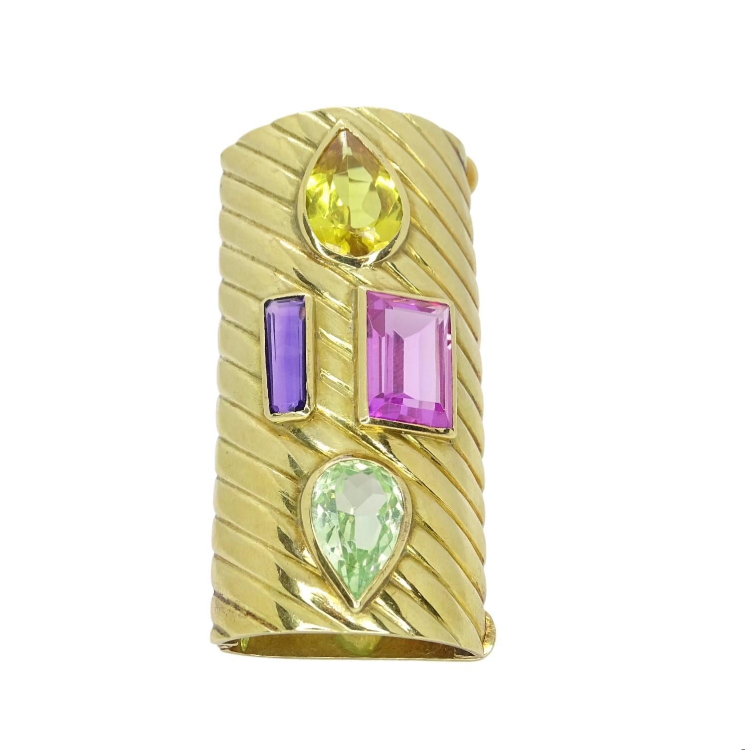 One of a kind necklace or brooch or pendant holder, Art Deco style, French high quality  jewelry, 70s SXX.
With a rectangular and convex profile on 18 kt gallon gold, 4 semi-precious stones are expressed inlaid: amethyst, topaz, French rose and