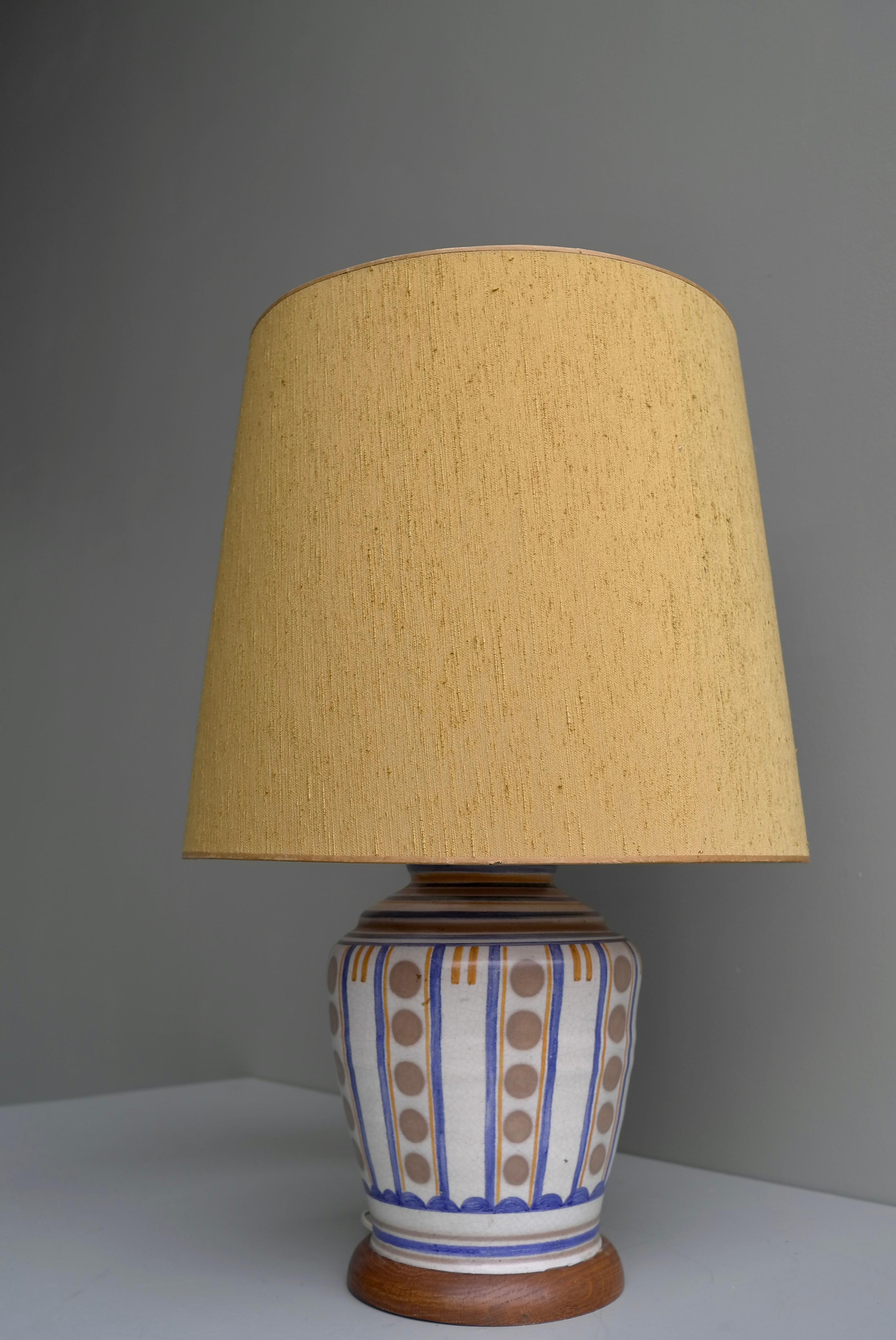 Art Deco French ceramic and wood table lamp with silk lampshade, France, 1940s.