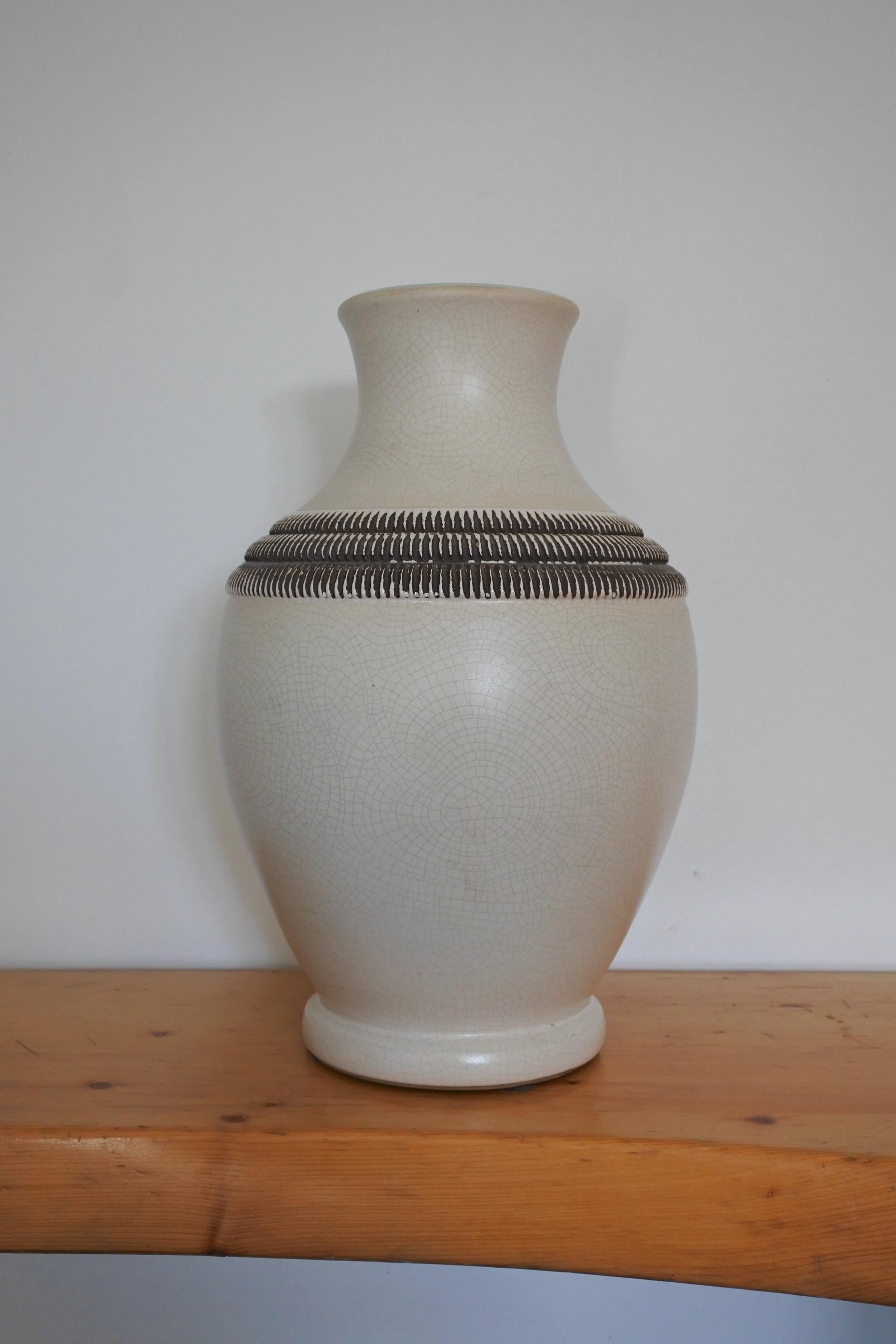 Ceramic vase by renowned French potter Pol Chambost.
Signed.
Mint condition.
  