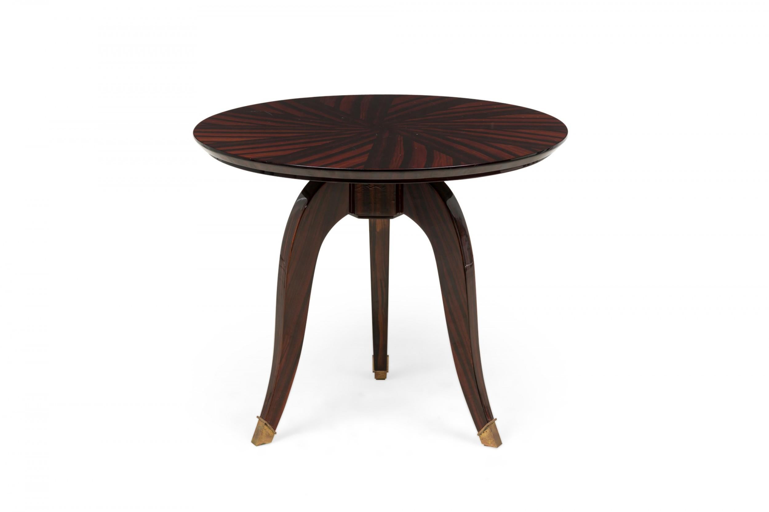 Art Deco French circular end / side table with a beveled top inlaid with a contrasting 