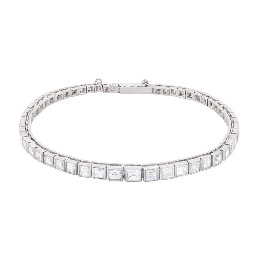 Graduating in size, this beautifully made bracelet is made up of French cut diamonds. The use of French cut diamonds was rare during the 1920s, making this a truly unique. Starting at 0.35 carat and sliding down to 0.10 carat, the total weight is