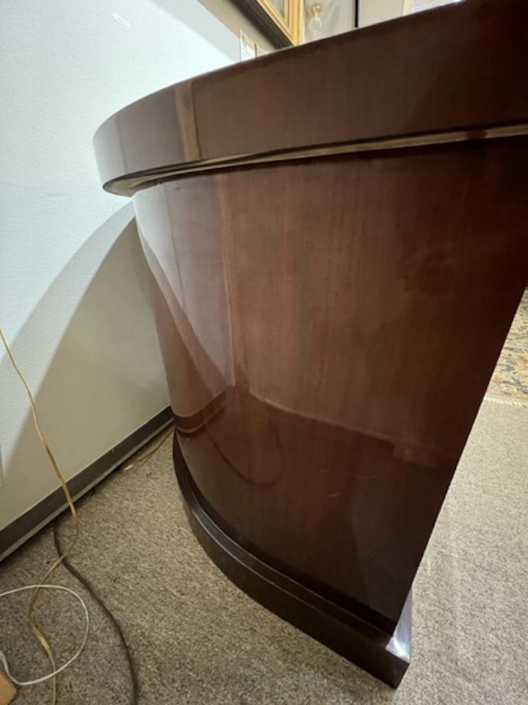 Beautiful desk is made out of walnut wood, middle section of the desk top is covered with cowhide. Desk has 4 spacious drawers with wide chrome handles. Has prominent base and wide legs opening. 

Condition is good, finish is not renewed, slight