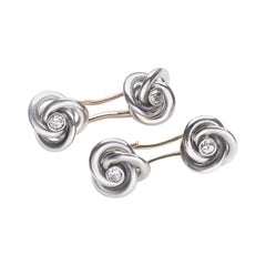 Art Deco French Diamond, Gold and Platinum Knot Cufflinks, Circa 1935