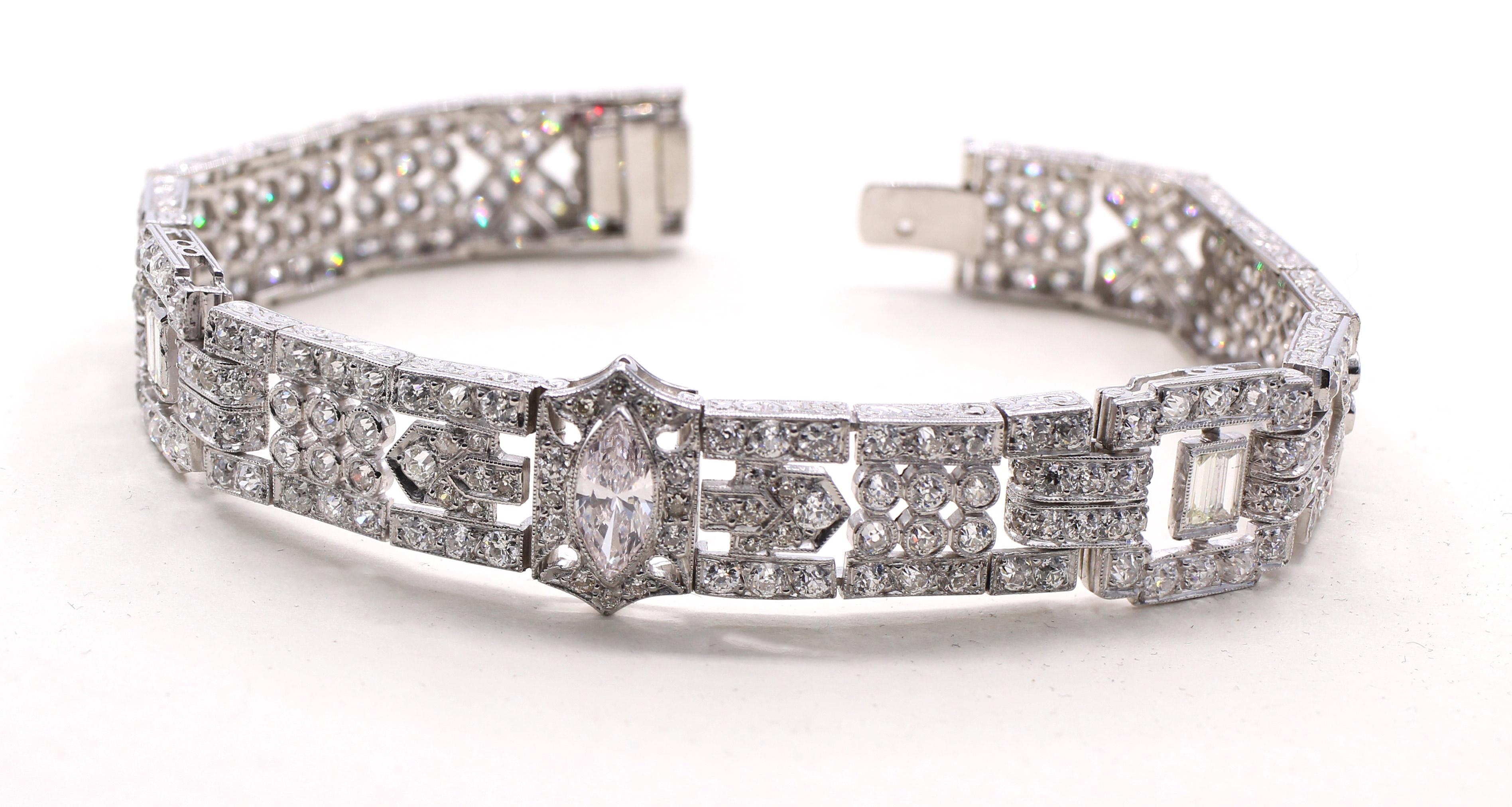 Magnificently designed and masterfully handcrafted in platinum this French Art Deco bracelet from ca 1925 is a true piece of art. The typical geometrical design from this era is beautifully displayed in this flexible bracelet with the center lozenge