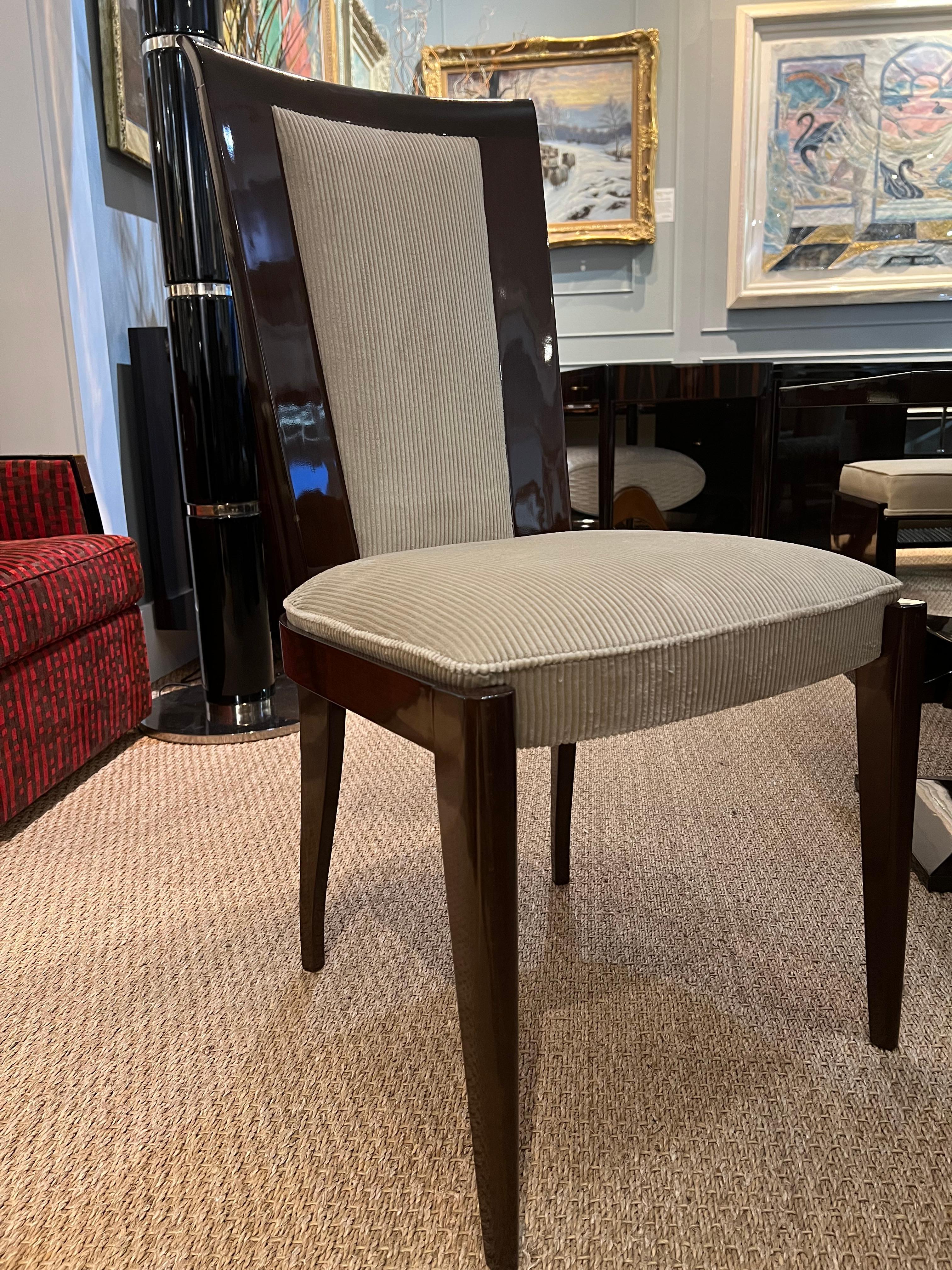 Set of 8 Art Deco dining chairs made out of high quality walnut wood. Newly re-upholstered in beige velvety fabric and re-polished. 

Condition is perfect. Restored
Could be sold separate.
France. 1930s
19.5