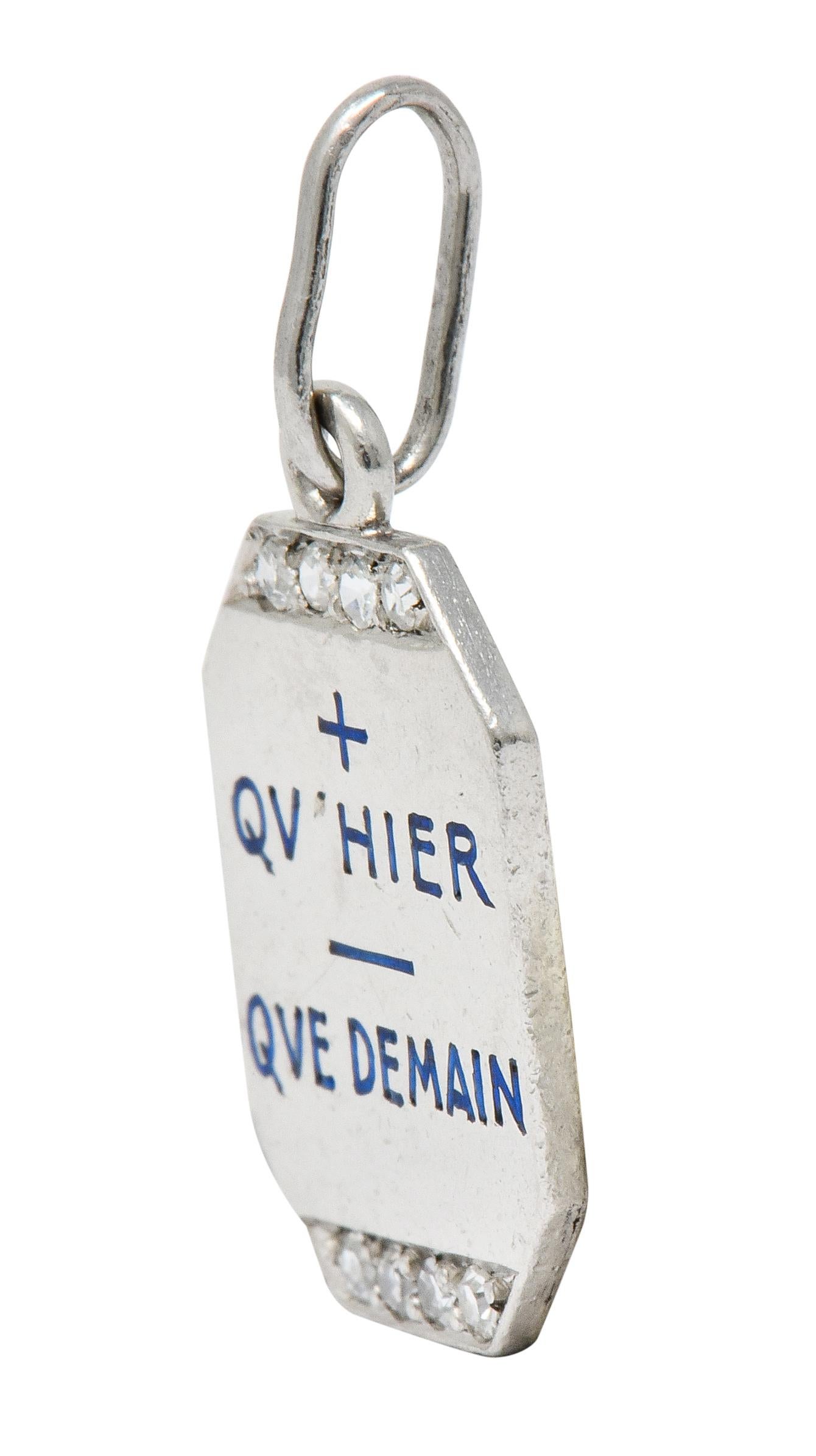 Charm designed as a hexagonal tag with verso 'Qu Hier Que Demain' French to mean 