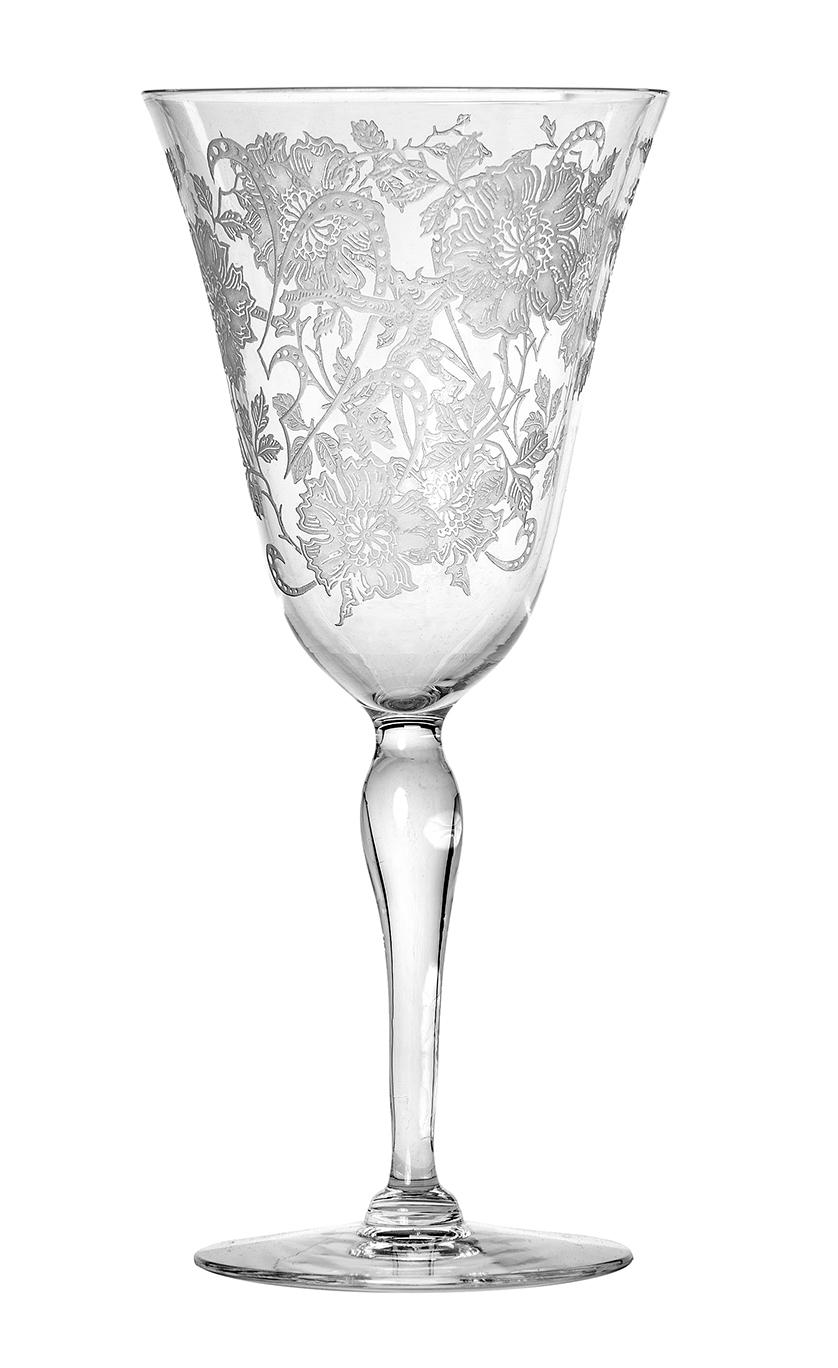 Late French Deco crystal stemware C1920-30's. Set of 8 in pristine condition. Fine blown glass wine goblets feature etched swirly pattern of flowers with leaves branches. The glasses have a beautiful weight to them and are in excellent condition. A