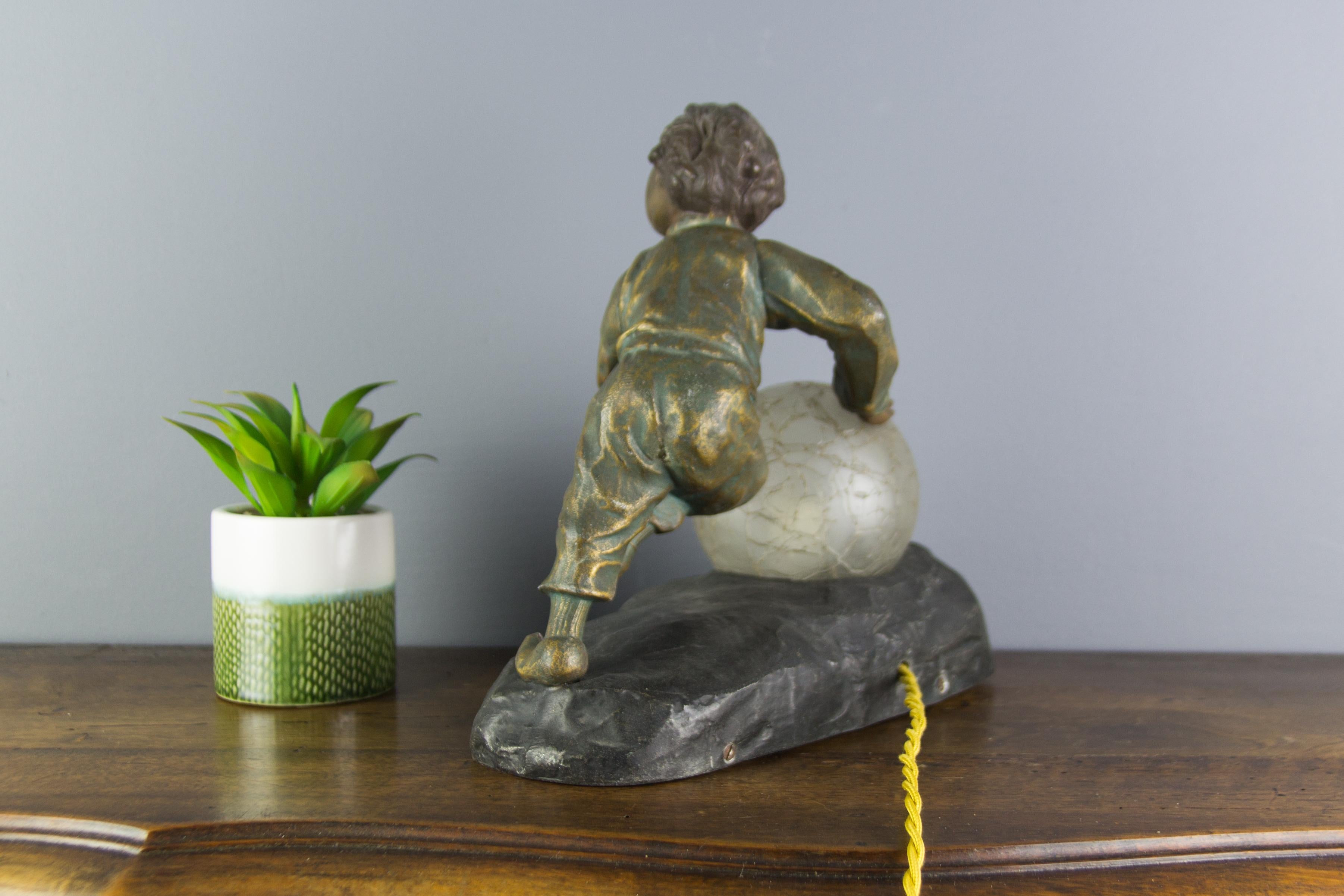 Art Deco French Figural Lamp Boy Pushing a Snowball Crackle Glass Globe Shade 6