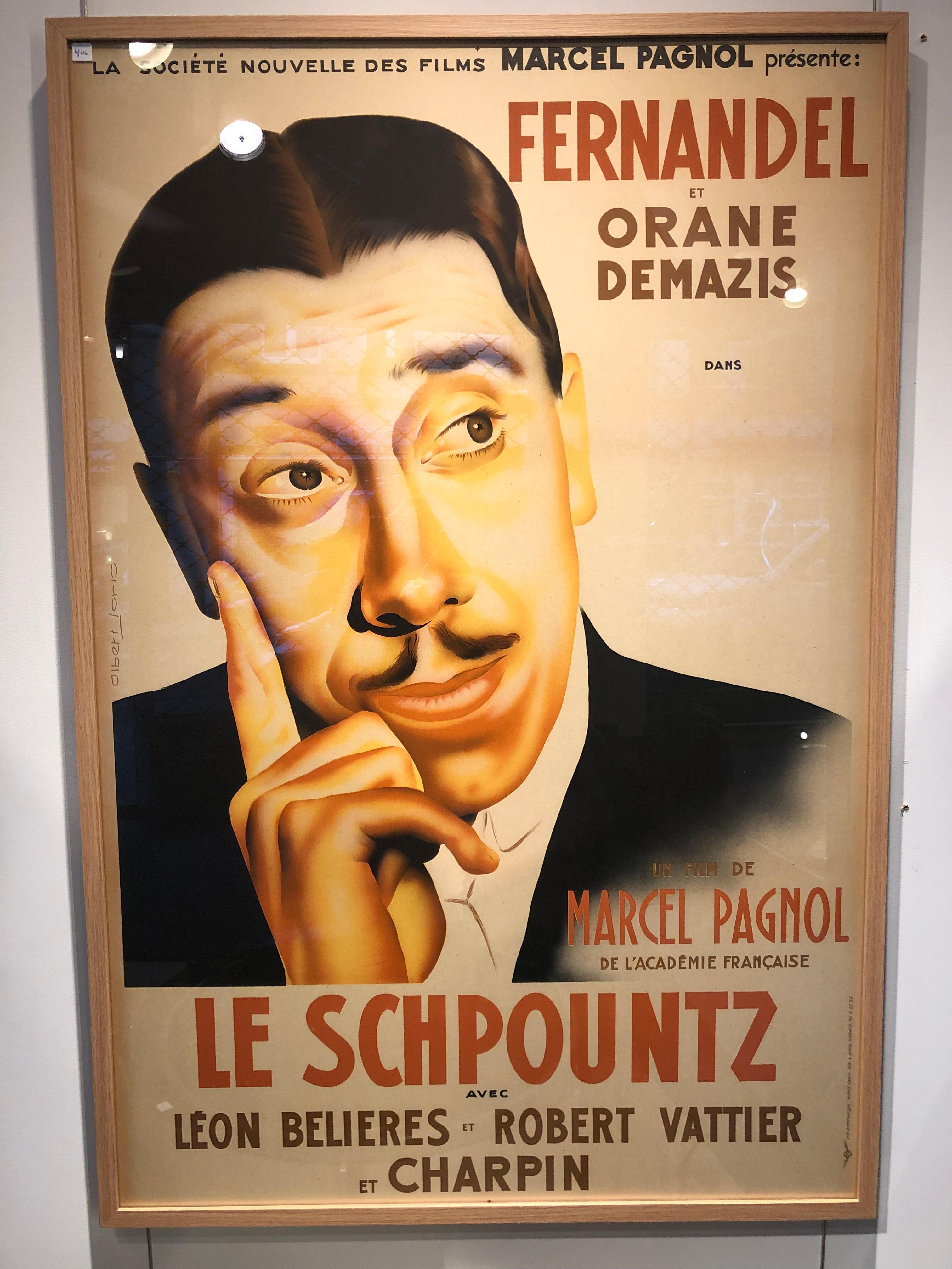 Film poster le Schpountz de Marcel Pagnol with Fernandel from the 40’s 
This film poster is made by Alfred Jorio in imprimerie monégasque Monaco.
 New frame with glass.