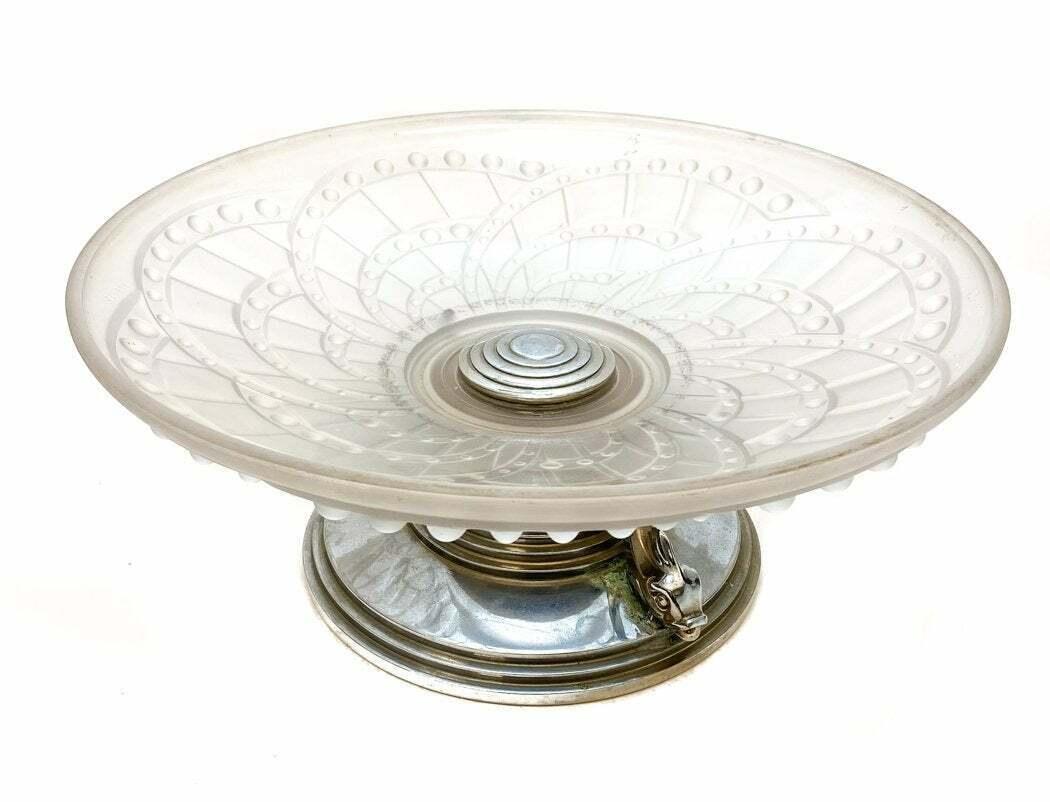 Art Deco French J. Landeier Glass & Sliverplate Centerpiece Bowl, circa 1930

Bubble swirls to the exterior of the frosted glass. Figural dolphins to the silverplate and wood base. J. Landier France Molded signature to the rim of the bowl.