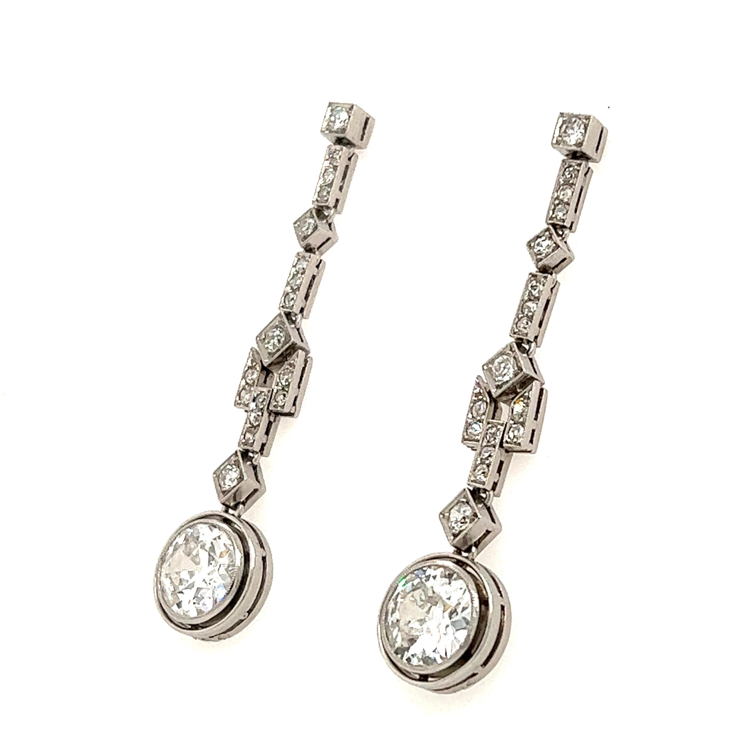 Amazing creation crafted over 100 years ago. This fantastic pair of earrings is crafted in platinum and has  truly stood the test of time as they are more beautiful today, than the day they were created. The earrings are set with approximately 4.60