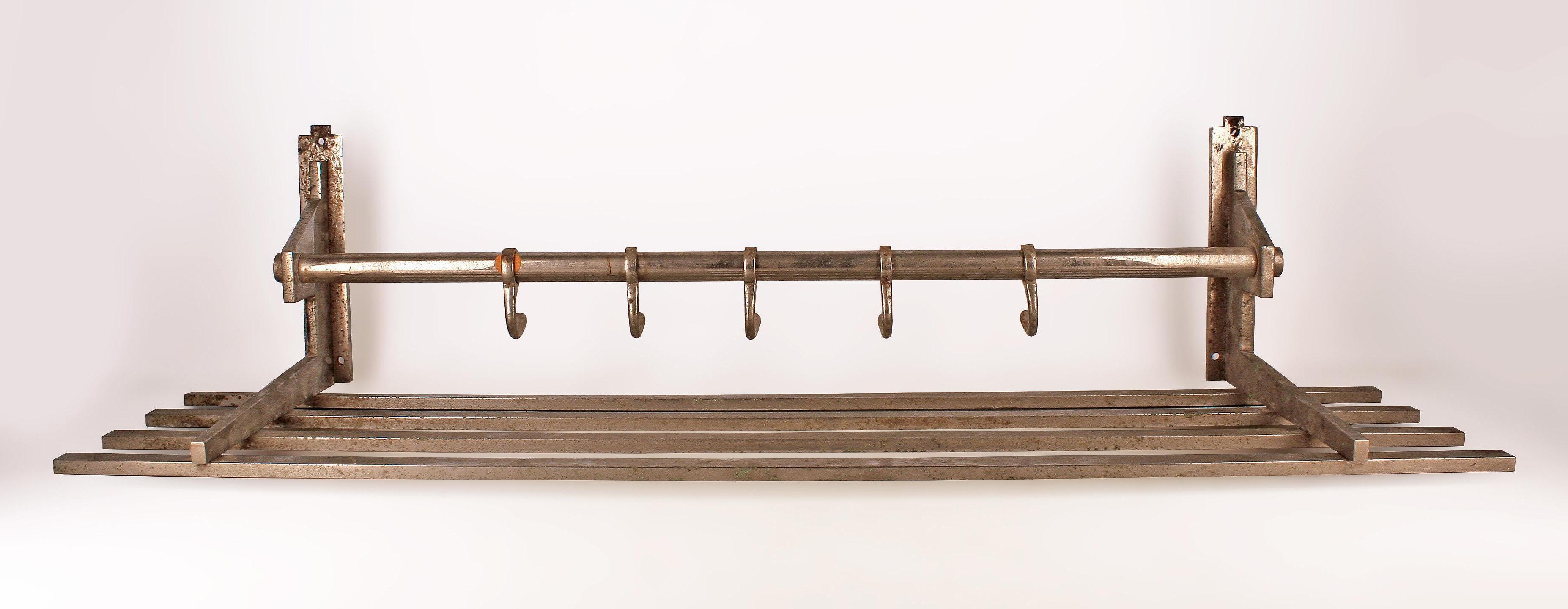 Early 20th century Art Déco french metal brass wall coat hanger/rack designed by La Maison Desny

By:  La Maison Desny
Material: brass, copper, metal, zinc
Technique: cast, forged, metalwork, molded, polished
Dimensions: 10 in x 36 in x 9 in
Date: