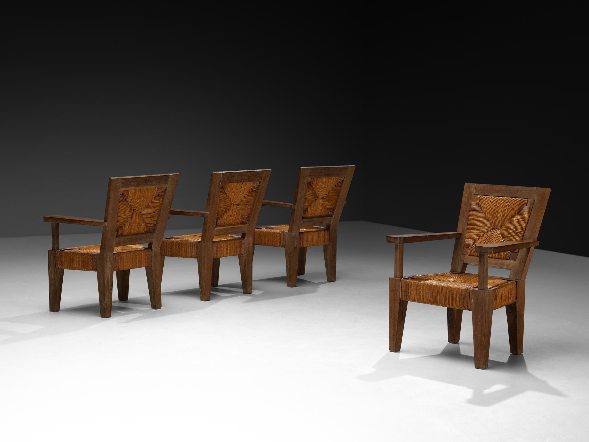 Fauteuils monumentaux français Art Déco en chêne et jonc en vente 3