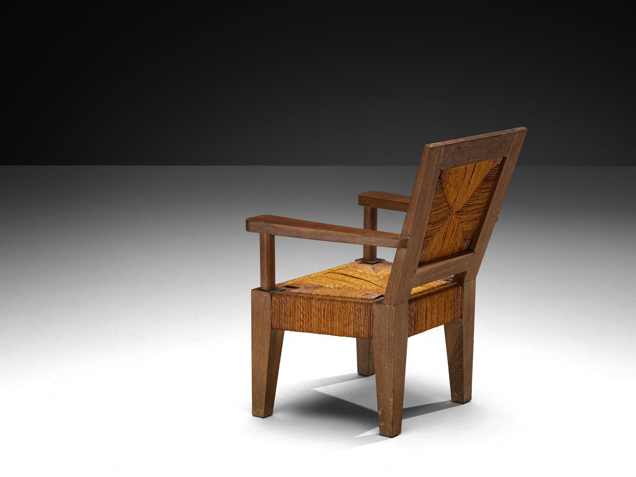 Jonc Fauteuils monumentaux français Art Déco en chêne et jonc en vente