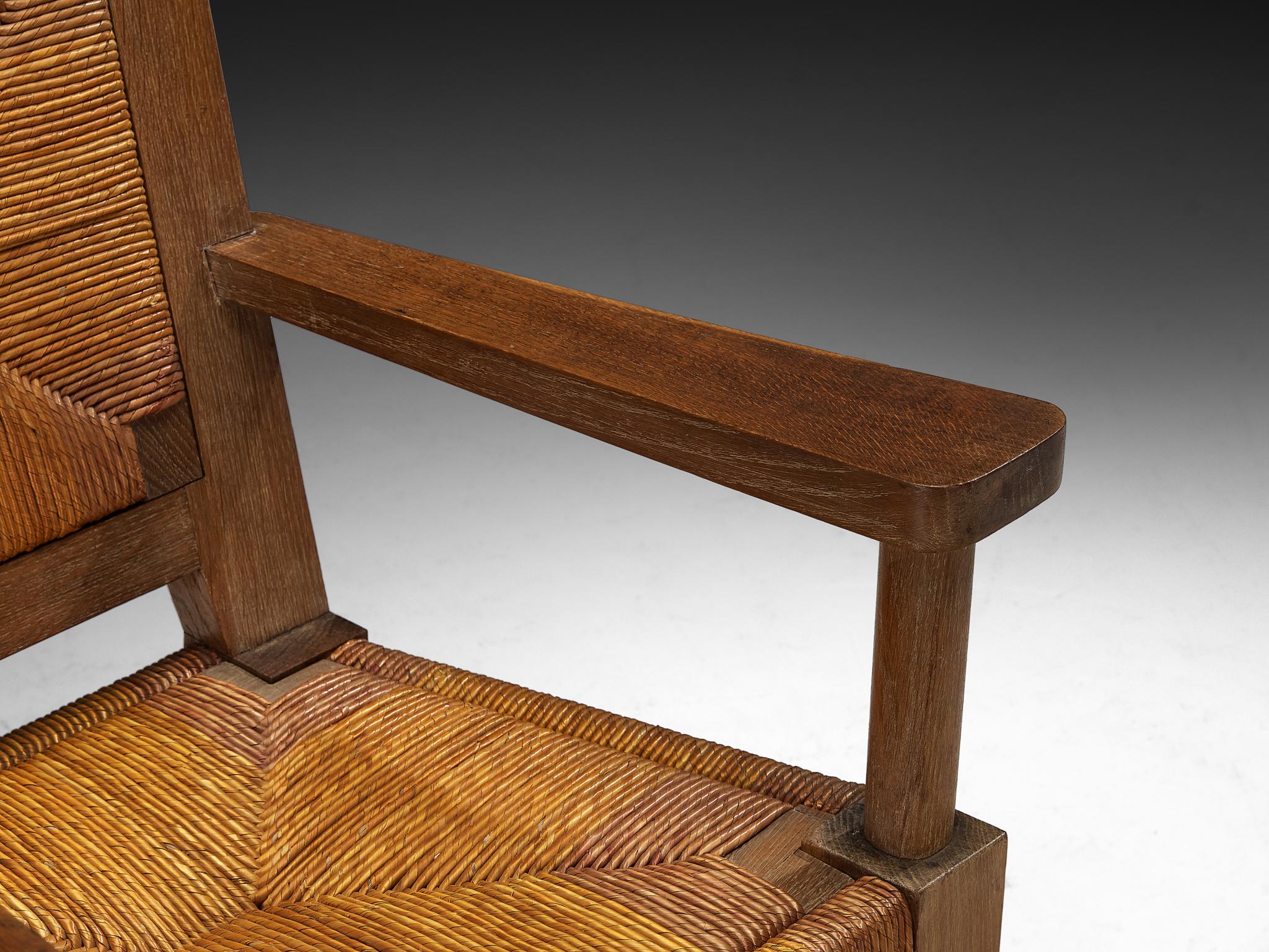 Fauteuils monumentaux français Art Déco en chêne et jonc en vente 2