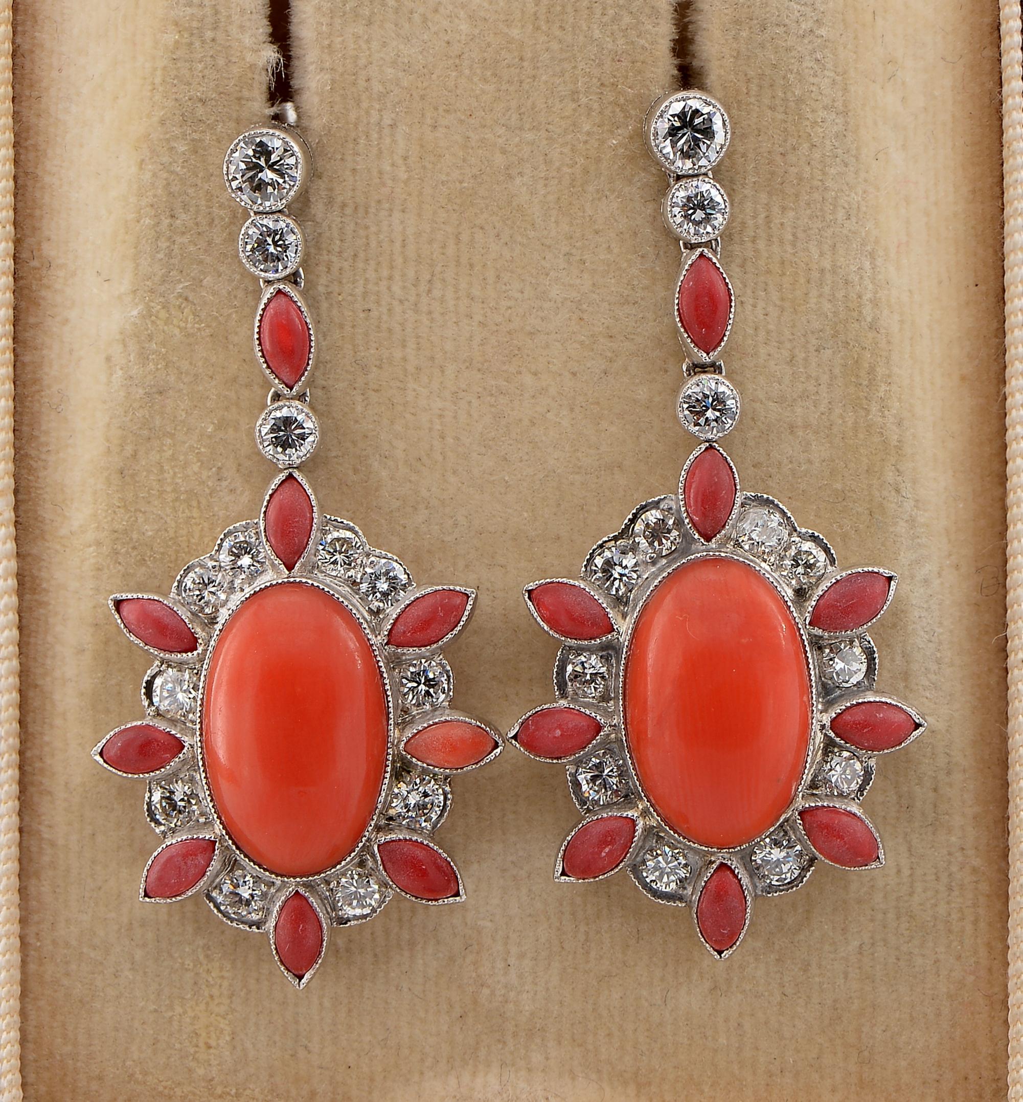 Coral Seduction
Sensual and distinctive this pair of Art Deco period drop earrings, 1925 ca
They have been hand fabricated of solid Platinum, bearing French hallmarks
The striking design artfully combines an eye-catching mix of Natural Red Coral and