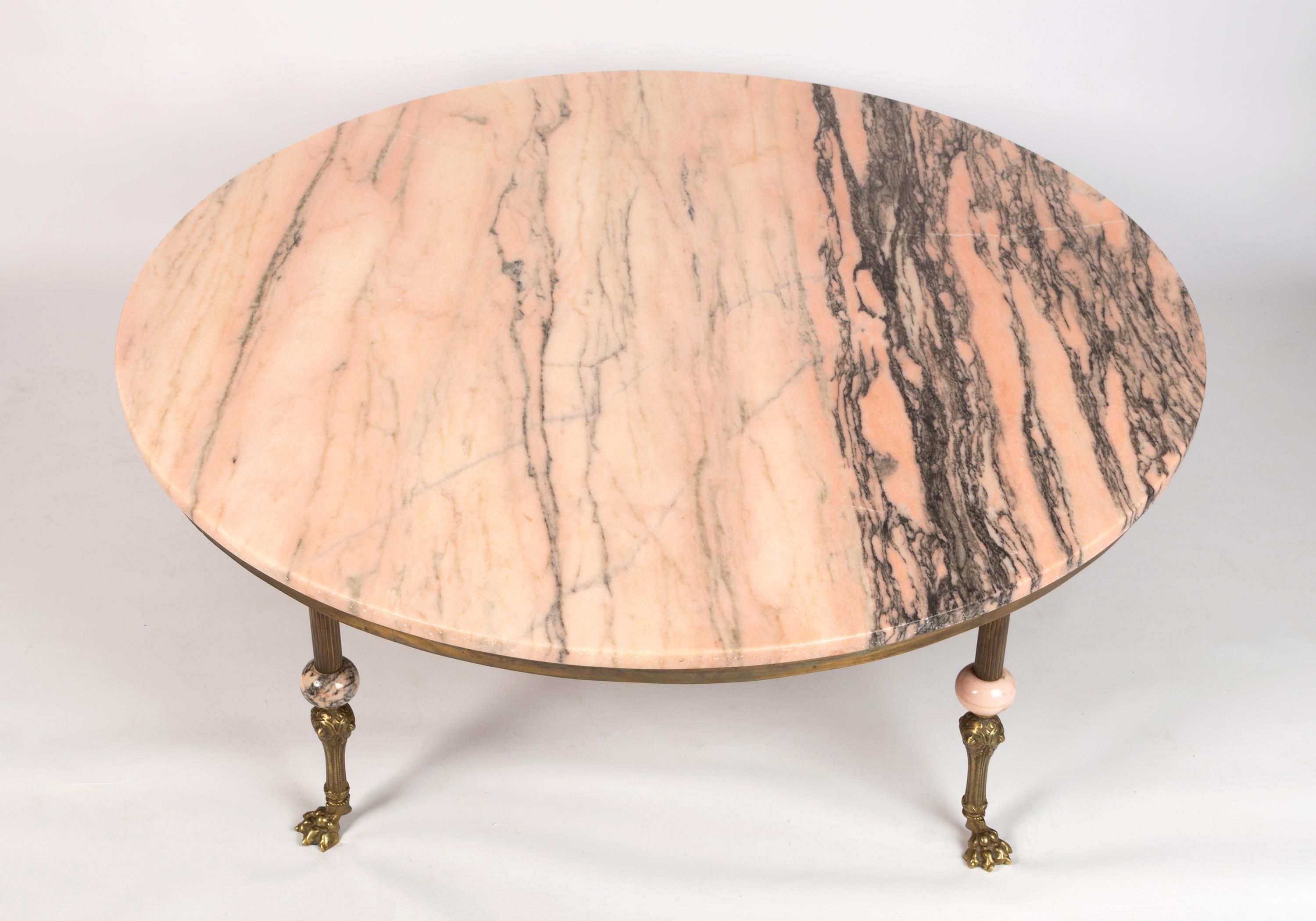 Art Deco French pink marble & brass large coffee table.
By Maison Jansen C.1940.

In very good condition commensurate with age.