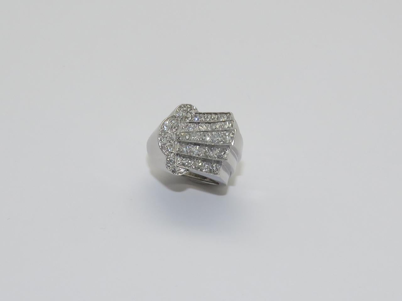 Total Weight Diamond: 2 Ct approximately

Ring Size 4 1/2

Measurements:
Height: 1.18 in ( 3 cm )     Lenght: 0.91 in ( 2.30 cm )     Width: 0.75 in ( 1.90 cm )     Weight: 12.80 grams