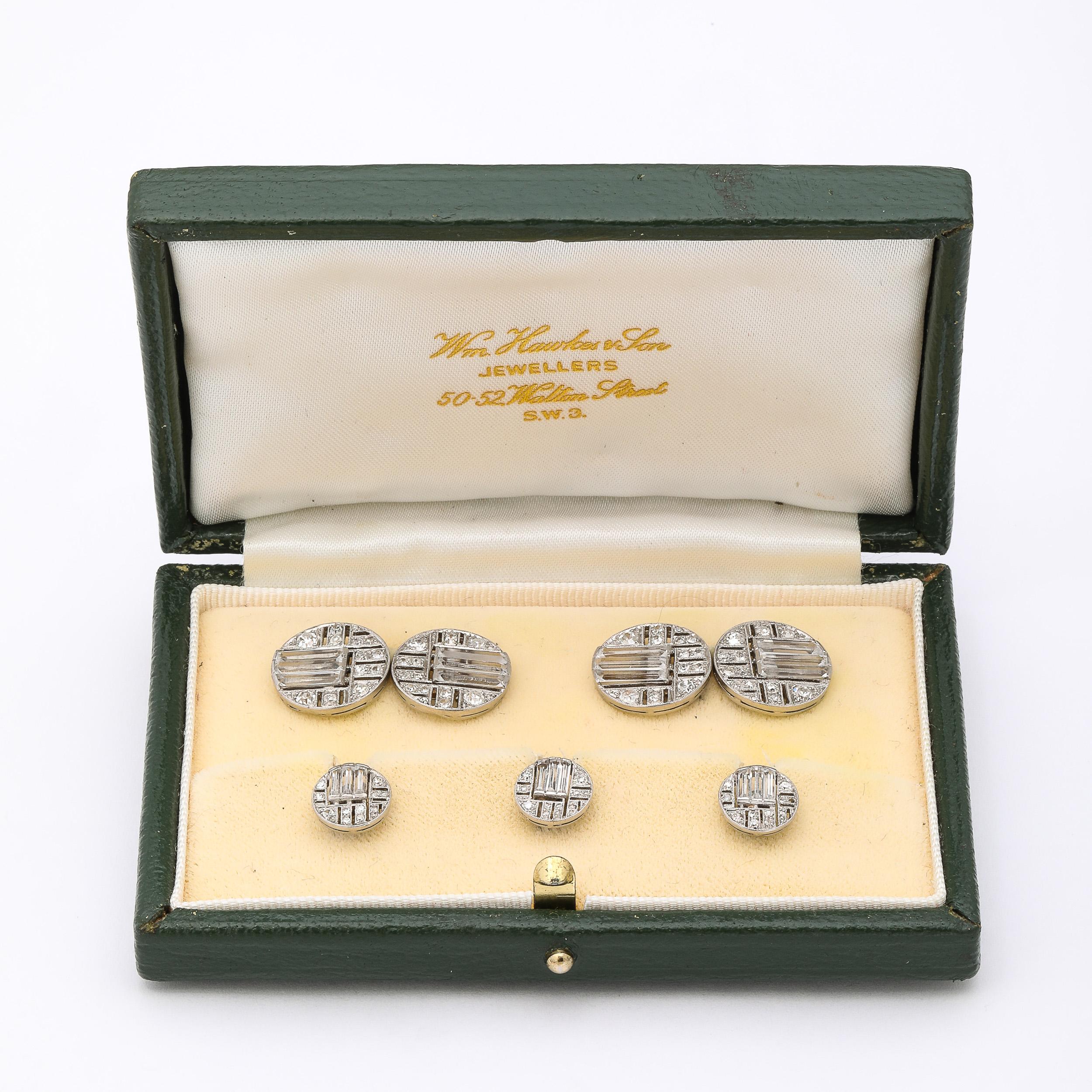 These remarkably crafted and precise Art Deco French Platinum Diamond Cufflinks and Stud Set originate from France, Circa 1930. A timeless expression of the opulence, attention to detail, and rigorously balanced and artfully achieved geometry