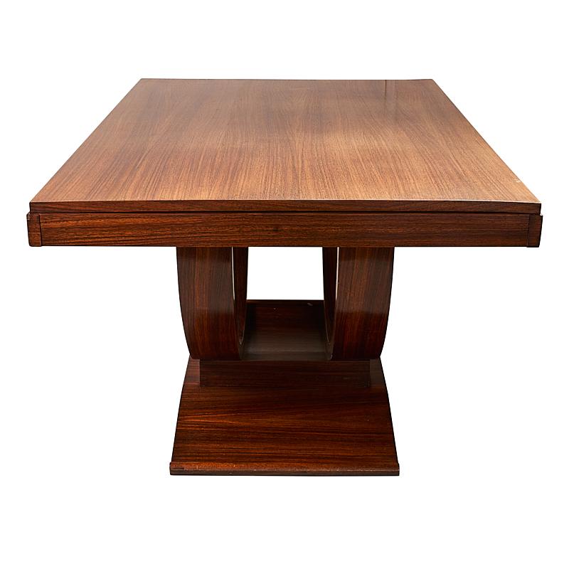 Art deco French table crafted from rosewood featuring a U-shaped base, circa 1930. 

Since Schumacher was founded in 1889, our family-owned company has been synonymous with style, taste, and innovation. A passion for luxury and an unwavering