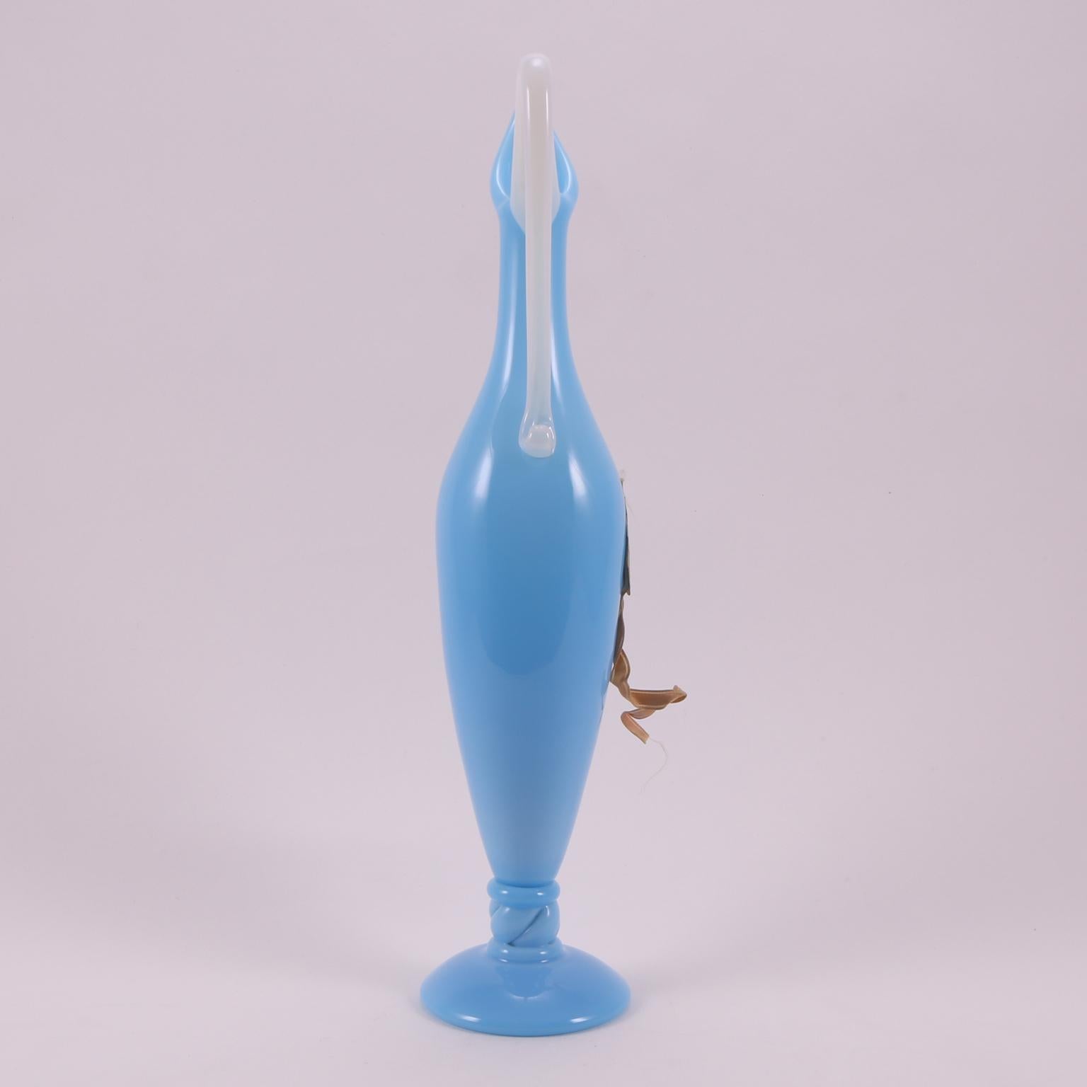 A lovely quality piece of Deco French Sèvres Opaline glass, hand blown in France in 1920, this pitcher looks like a real sculpture, with an incredible historical value.
With original ribbon and label, that are in perfect shape, and on the backward