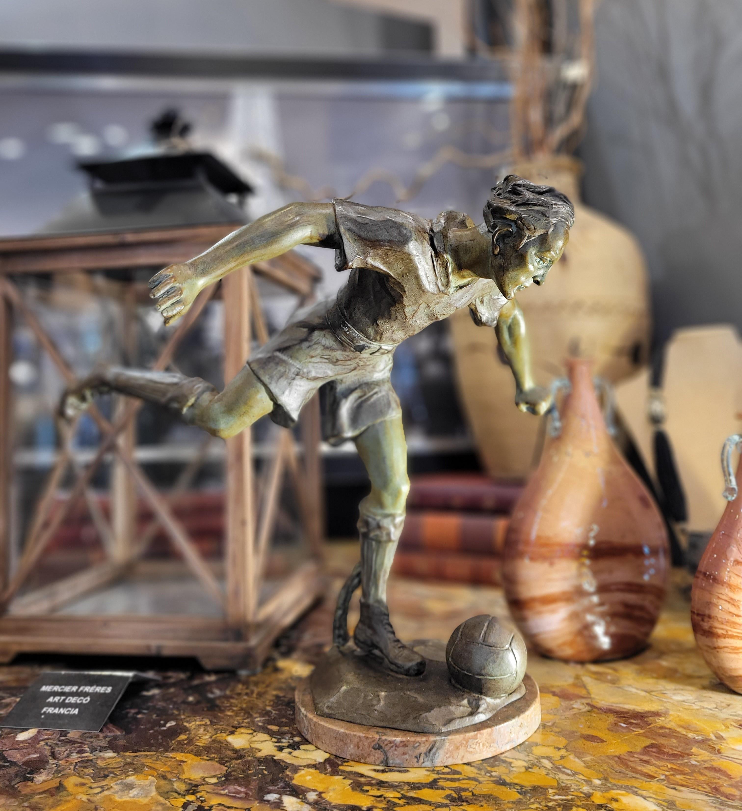 soccer player statue