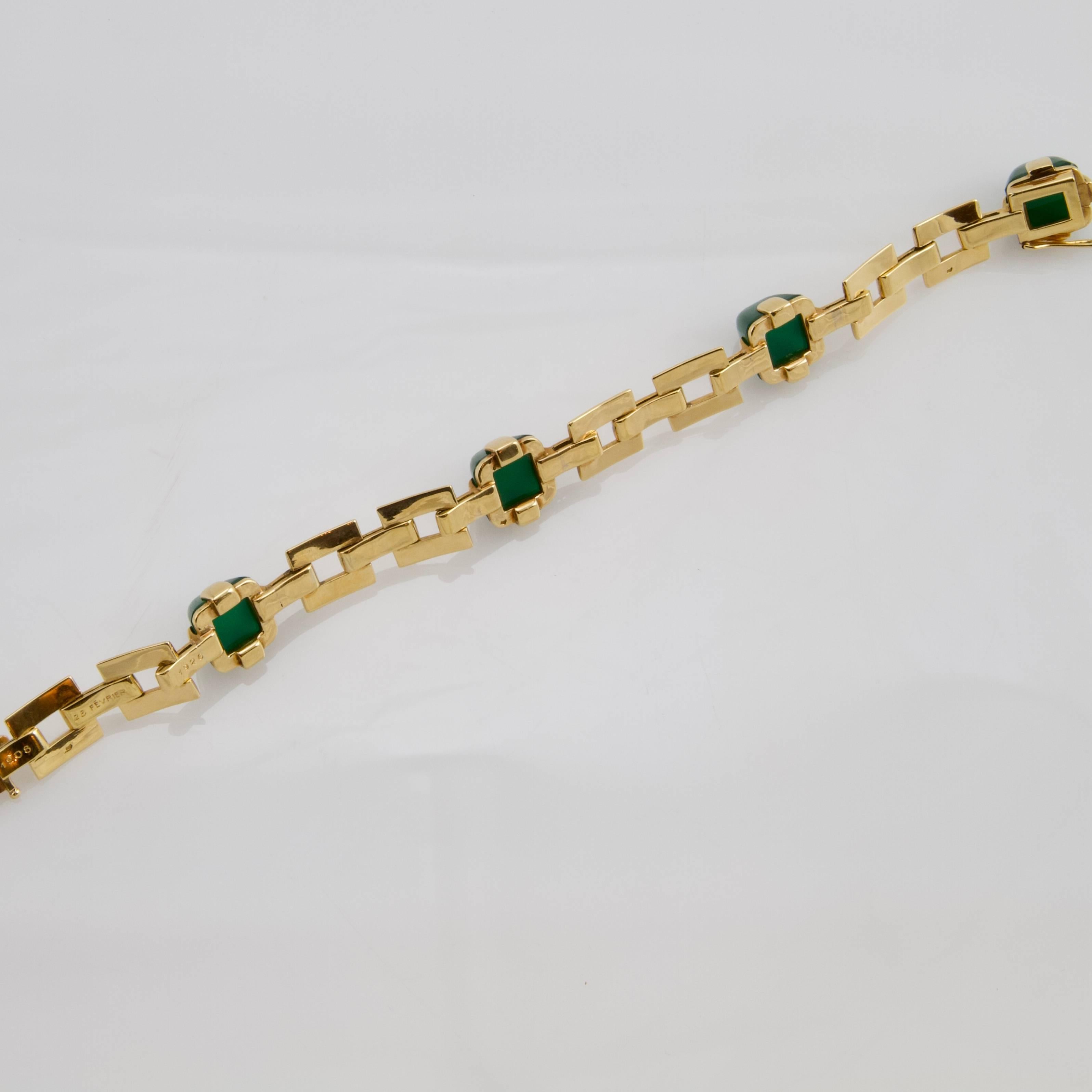 A very amazing art deco in yellow gold...bracelet adorned with four green chalcedony cabochon. Yellow gold is burnished, extremely dense and soft as silk. Under, inscription engraved 