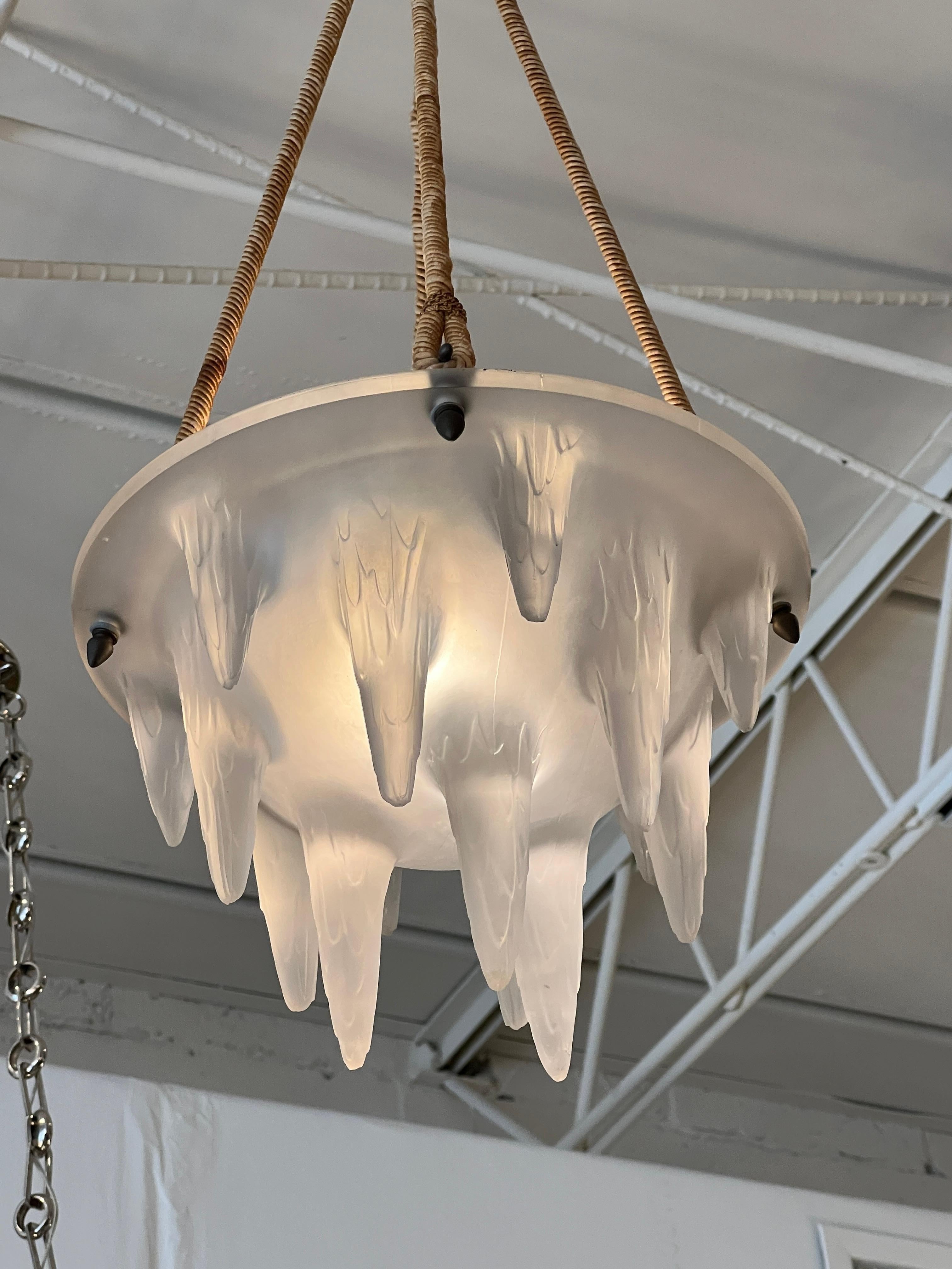 Art Deco molded frosted glass chandelier by Rene Lalique entitled Stalactites. This style was designed in 1912.
Signature: VdA 