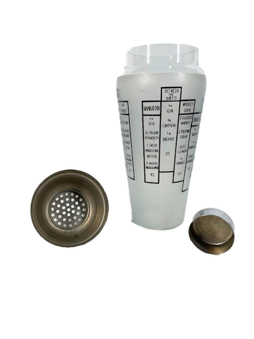 Art Deco recipe cocktail shaker with black graphics on frosted ground having 2 panels of 7 recipes and a domed chrome center pour lid with integral strainer.