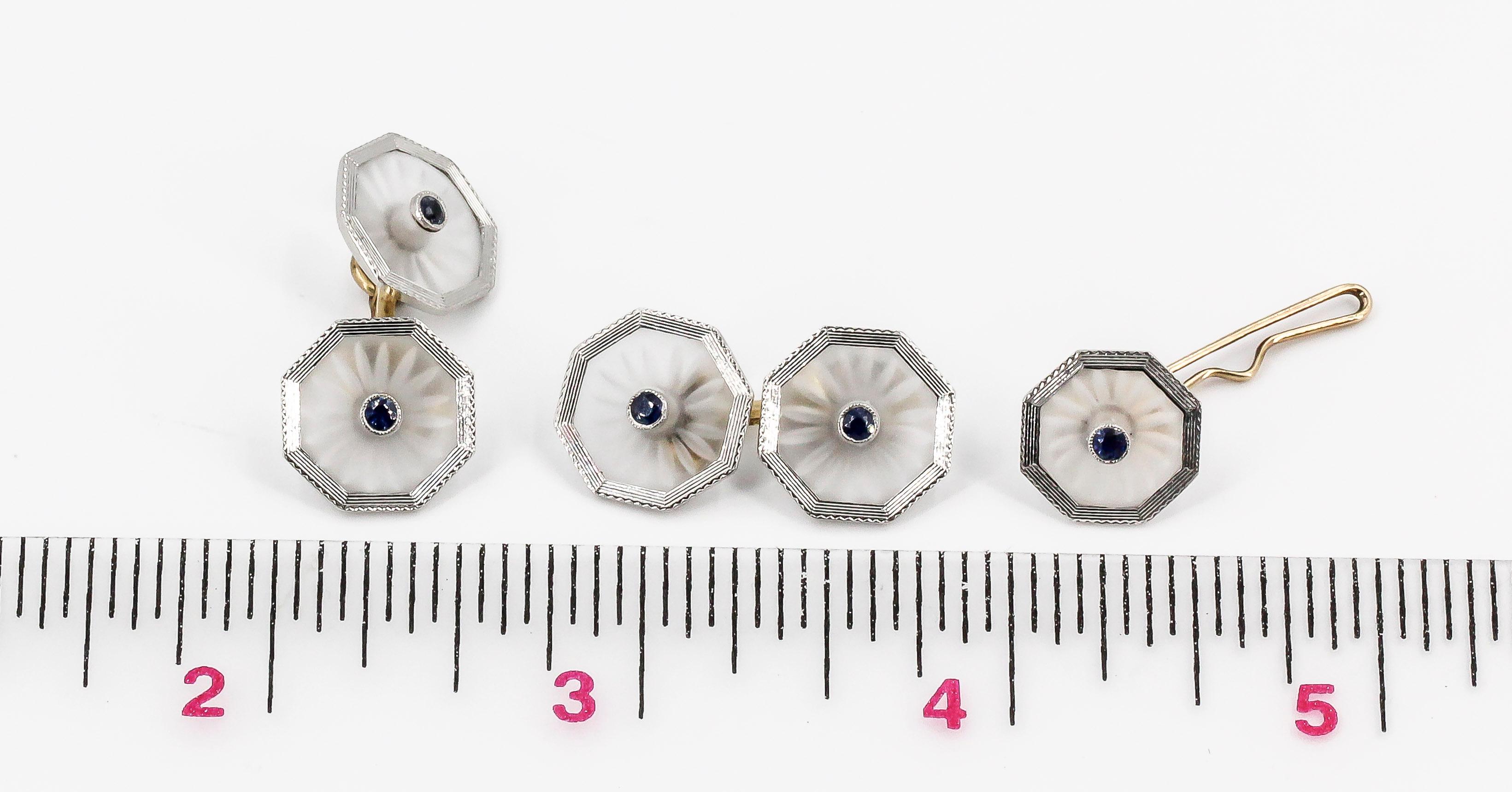 Handsome frosted rock crystal, sapphire, platinum and 14K yellow gold cufflinks, studs and collar buttons set, circa 1920s. The set features 4 studs and three collar buttons, along with two cufflinks.

