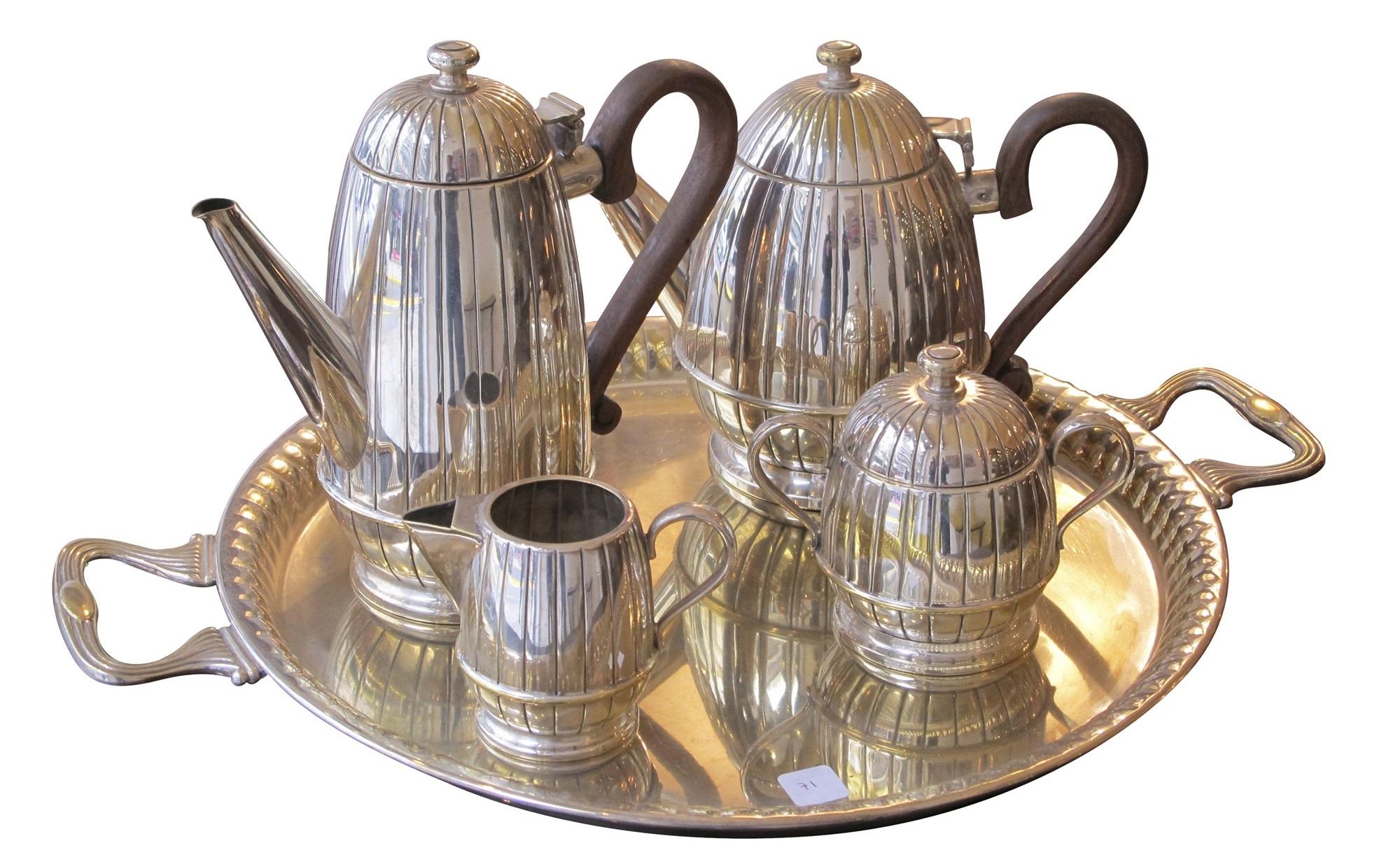 Full side tea and coffe service
Sign: Atenea
materials: silver plated and wood
We have specialized in the sale of Art Deco and Art Nouveau and Vintage styles since 1982. If you have any questions we are at your disposal.
Pushing the button that