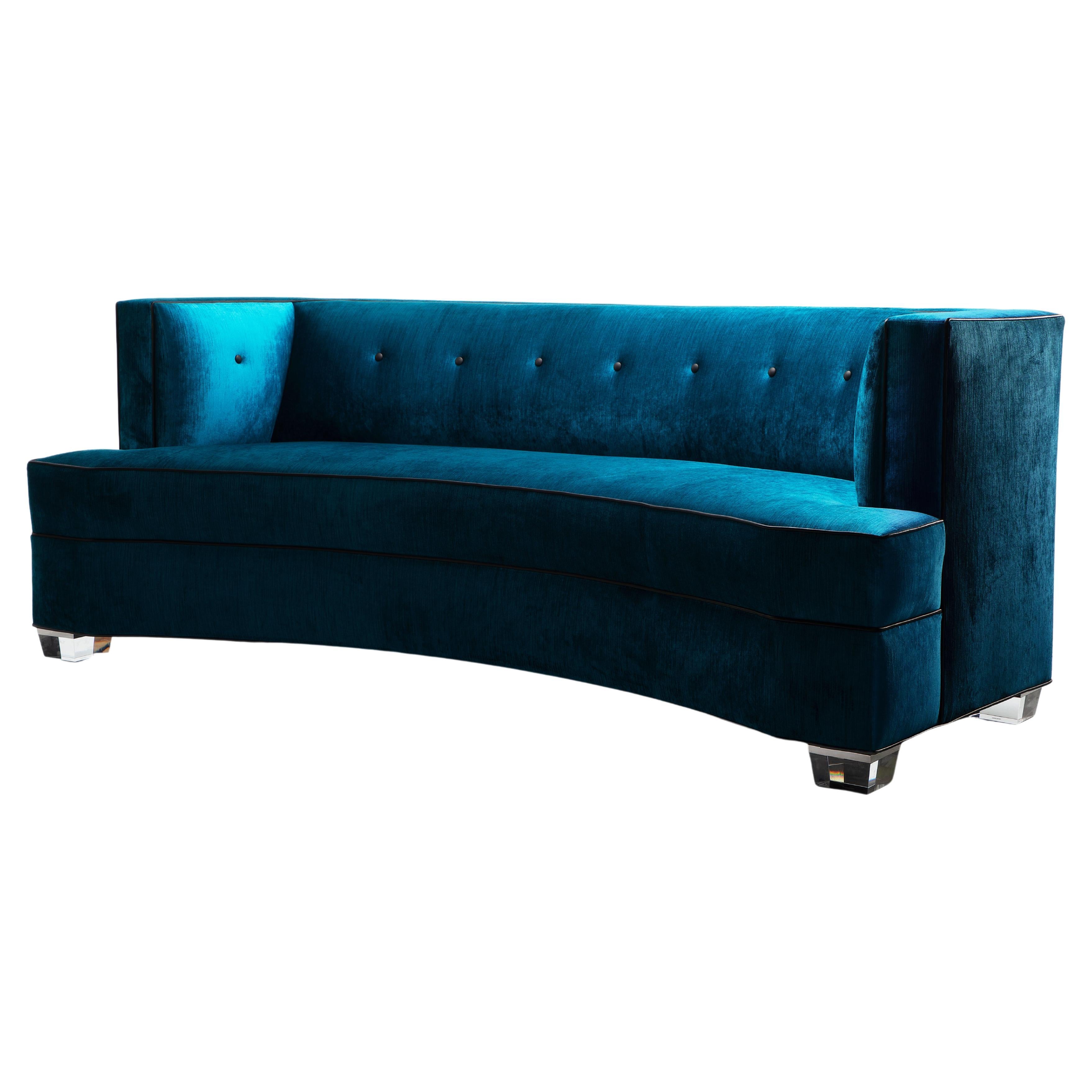 Presenting Gabriella, a shapely sofa with finishes fit for royalty. Whether covered in a rich velvet, wool or mohair, her rounded body and sleek button detail command the room with her presence. A committed soul, she is at her best when cozied up