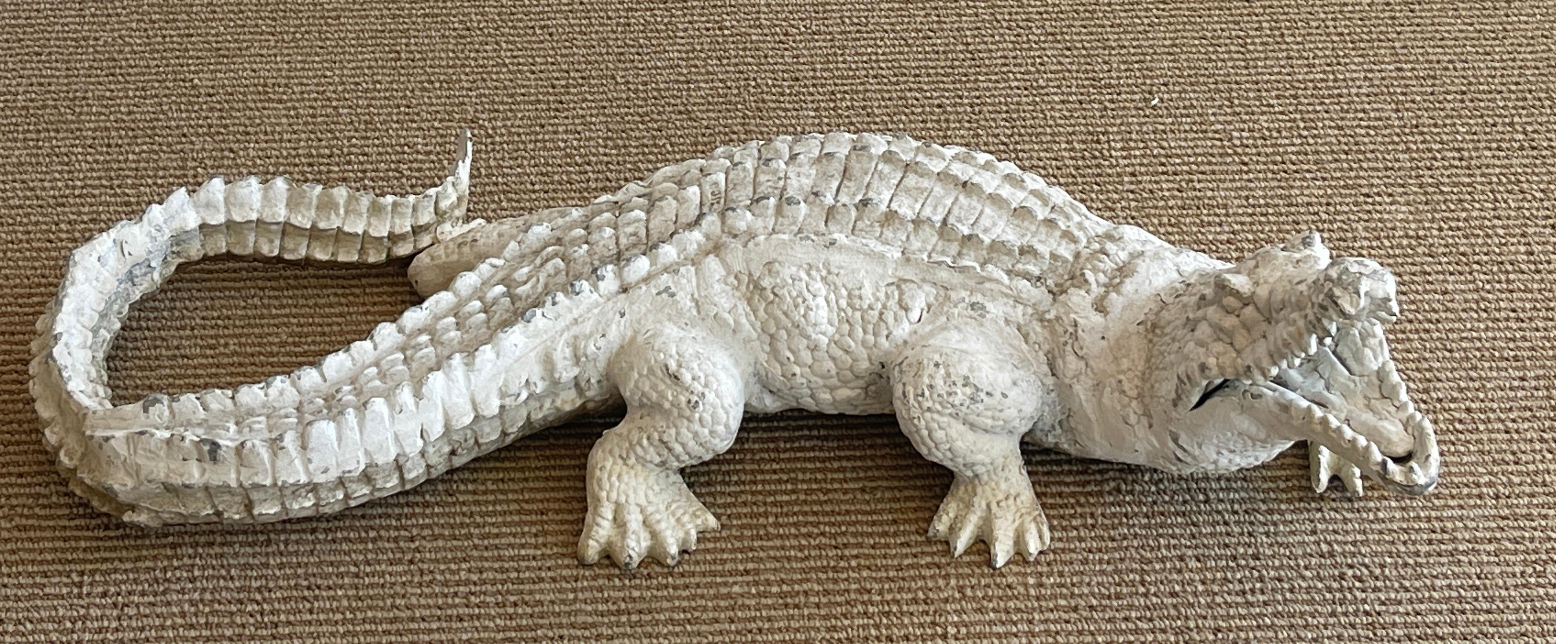 Art Deco garden Alligator, realistically cast and modeled white painted aluminum, beautiful patina. Ready to place indoors or outdoors. 

