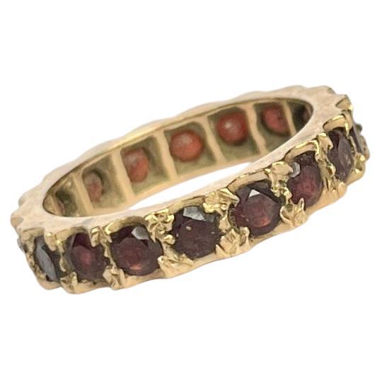 Eternity-Ring aus Granat und 9 Karat Gold im Art déco-Stil