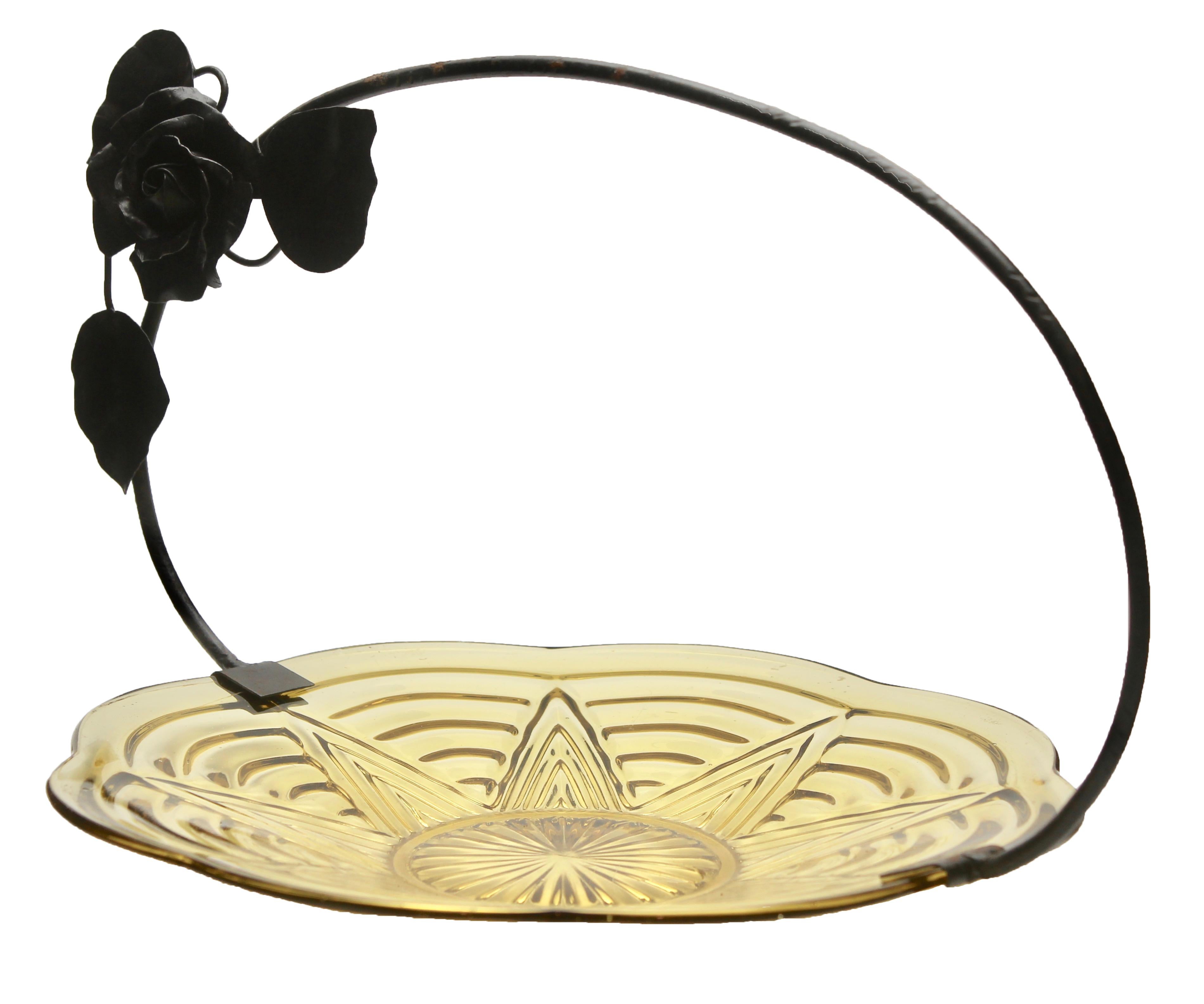 This unusual Belgian piece has the hallmarks of Belgian Art Deco and combines a glass gateau plate in a wrought iron carrier, the glass comes from an almost unknown factory, Pavillons de Beignee, who produced it between 1935 and 1940.
The recently