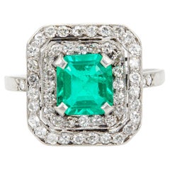 Anello Art Deco GCS con smeraldo colombiano a olio minore e diamante in platino a doppio alone