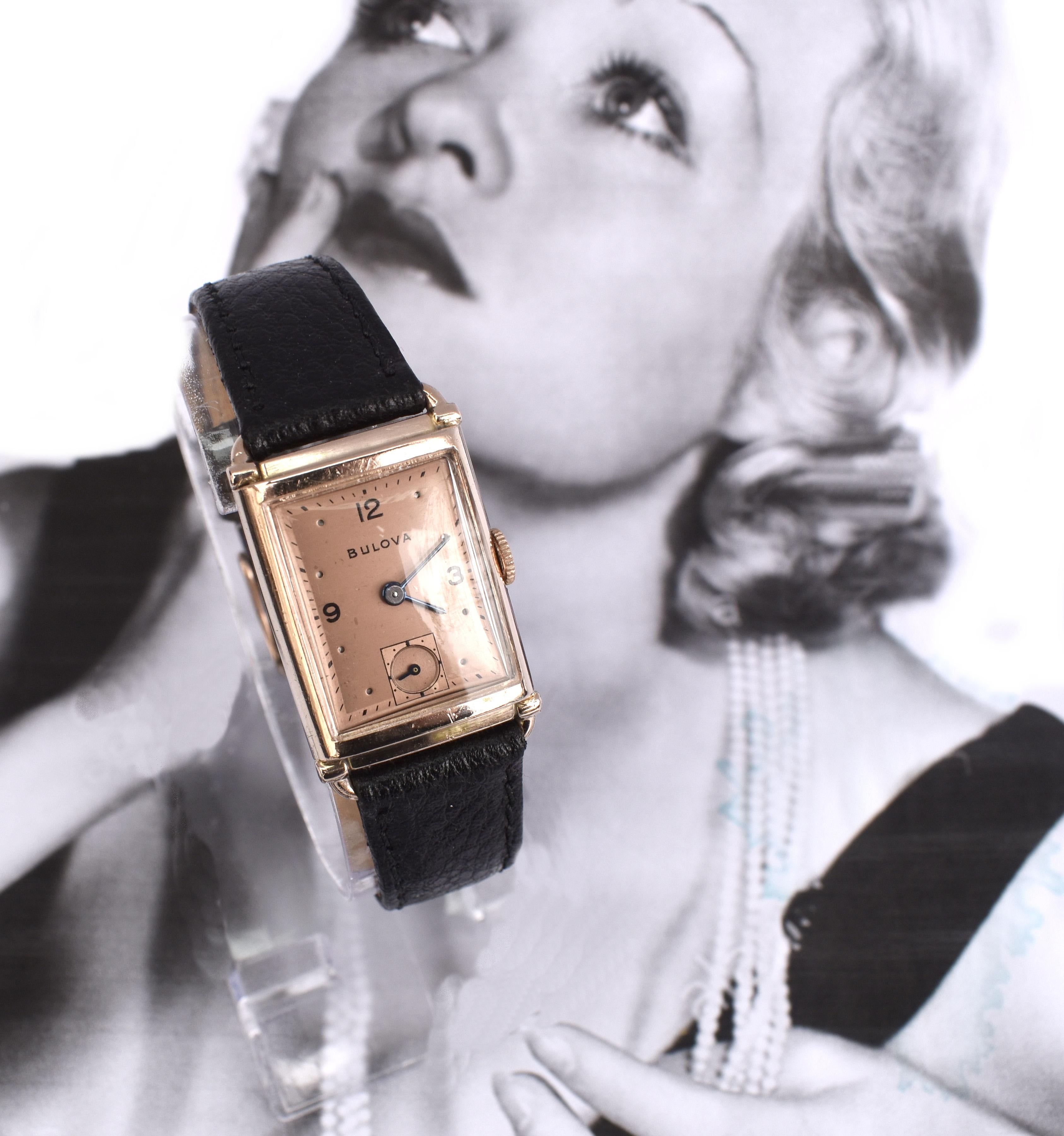 For your consideration is this fabulously stylish Art Deco Gents manual wrist watch by the American watch company Bulova. This 73 year old Art Deco watch known as the ‘PRESIDENT’ has a 14k rose gold-filled case and rare two-tone copper/ rose